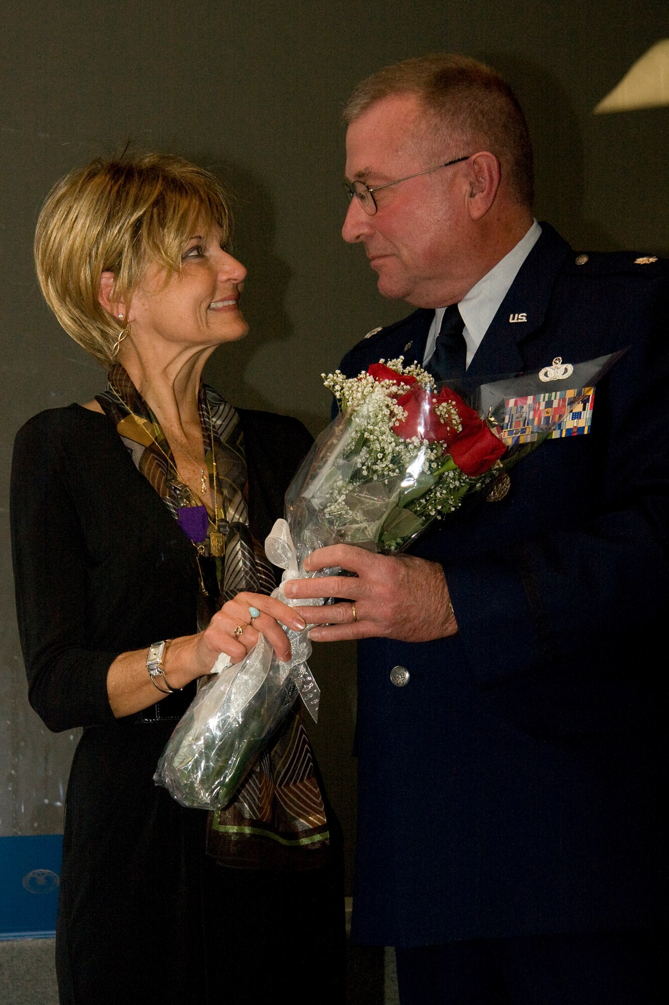 GRISSOM AIR RESERVE BASE, Ind. -- Lt. Col. Phil Shott gives his wife Katherine a boquet of roses as a thank you for her many years of support during his Air Force career. Colonel Shott, 434th Mission Support Group deputy commander, retired in a special ceremony held here recently. (U.S. Air Force photo/Tech. Sgt. Mark R. W. Orders-Woempner)
