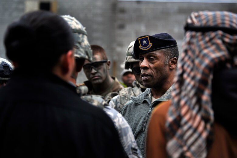 MOODY AIR FORCE BASE, Ga. -- Brig. Gen. Jimmy McMillian, security forces director at Headquarters U.S. Air Force, speaks with members of the 820th Base Defense Group after a demonstration was given at the military operations in urban terrain training village Feb. 10.
This demonstration was to show the capabilities of the 820th BDG and the roles they play during a deployment. (U.S. Air Force photo/Airman 1st Class Nicholas Benroth)(RELEASED)
