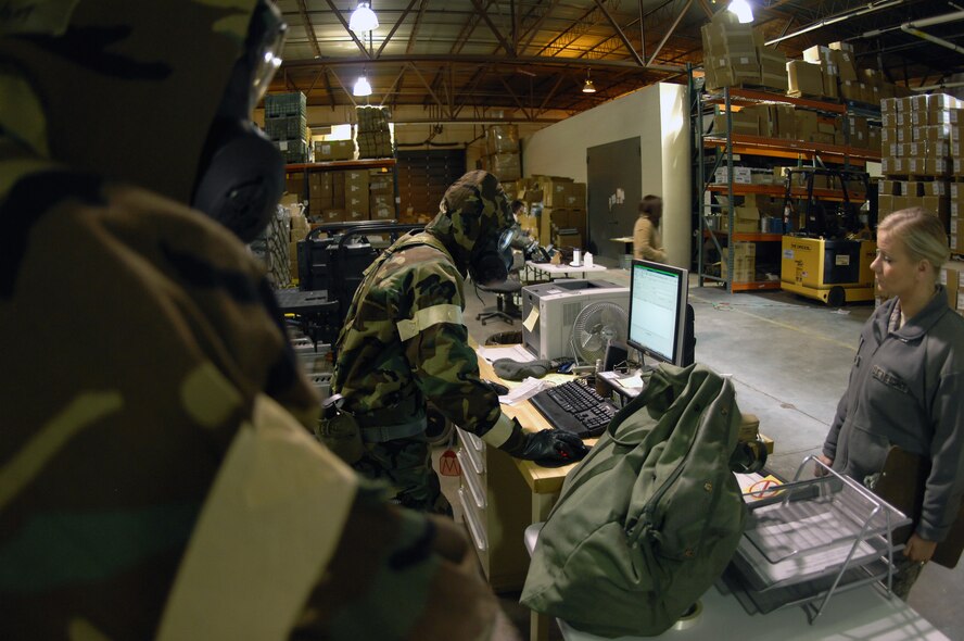 MINOT AIR FORCE BASE, N.D. – Senior Airman Gregory Rivera, 5th Logistics Readiness Squadron logistic supply apprentice, updates inventory sheets on the computer during a base exercise here Feb. 8. (U.S. Air Force photo/Staff Sgt. Miguel Lara III) 