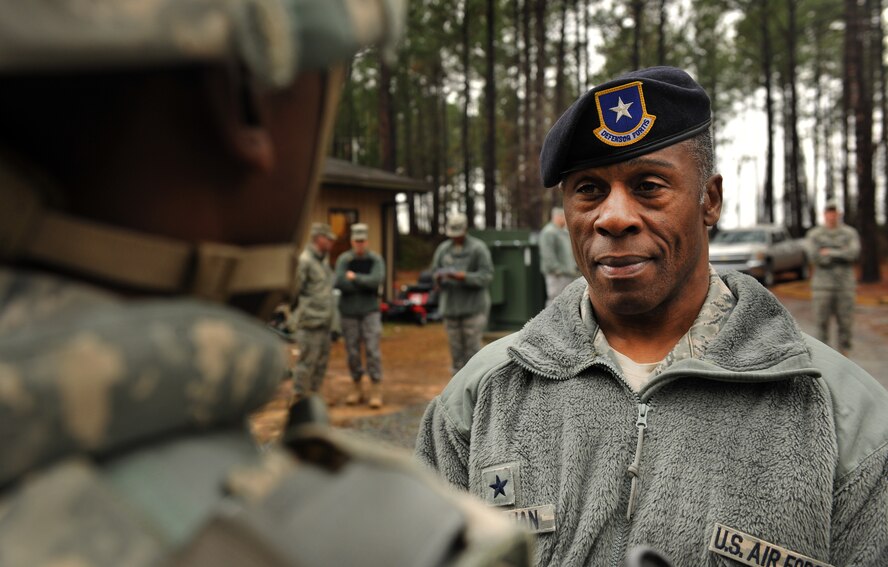 MOODY AIR FORCE BASE, Ga.-- Brig. Gen. Jimmy McMillian, Headquarters Air Force director of security forces, gets a little background information on Airmen from the 822nd Base Defense Squadron during a base visit right before a training demo Feb. 10. (U.S. Air Force photo/Airman 1st Class Joshua Green)(RELEASED)
