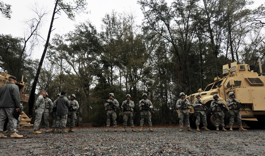 MOODY AIR FORCE BASE, Ga.-- Brig. Gen. Jimmy McMillian, Headquarters Air Force director of security forces, takes the time to ask Airmen from the 822nd Base Defense Squadron exactly what it is they do and the type of support they provide for their unit during a base visit Feb. 10. (U.S. Air Force photo/Airman 1st Class Joshua Green)(RELEASED)
