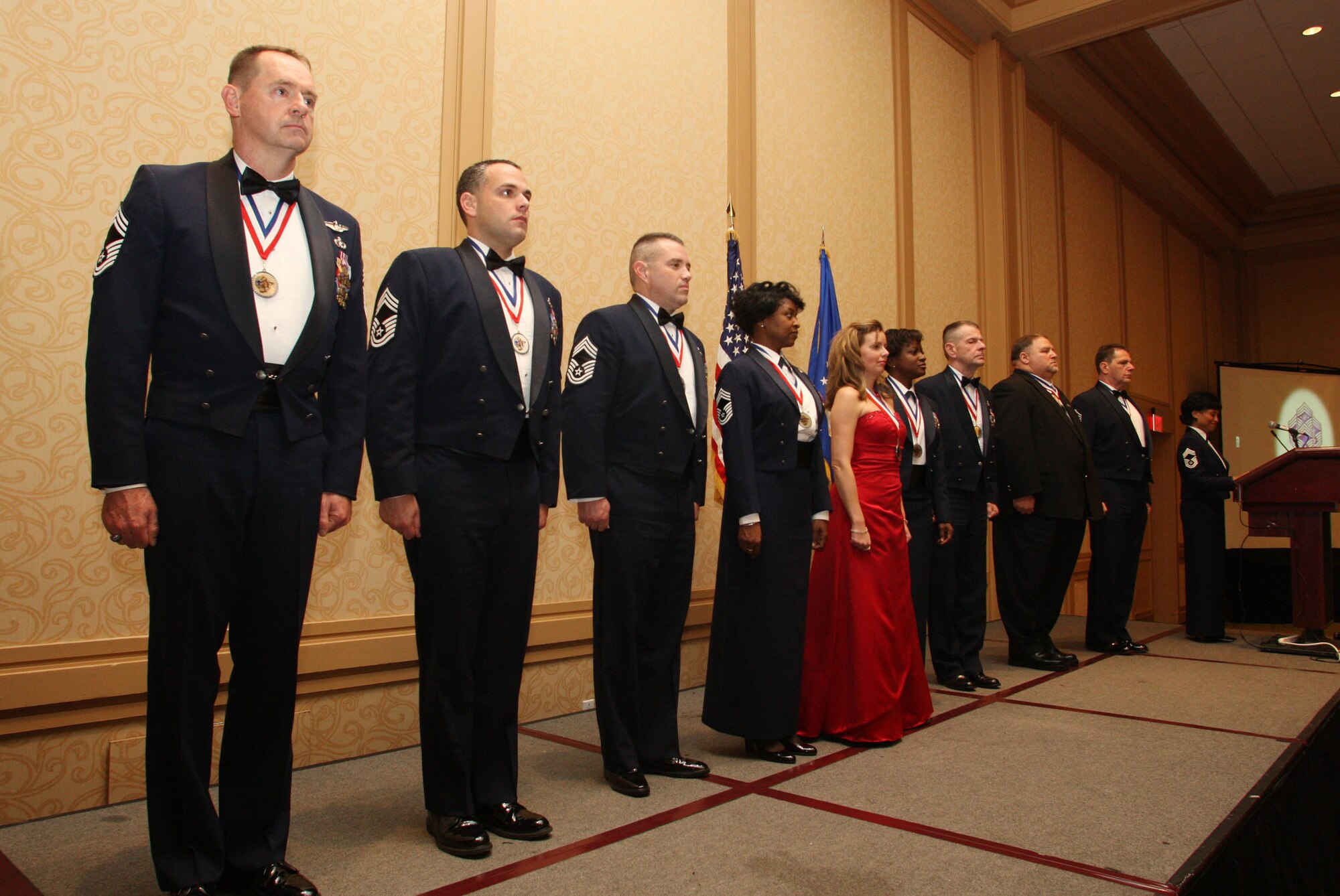 The newly promoted Chiefs take the stage for the official recognition ceremony. (U.S. Air Force Photo/Don Peek)