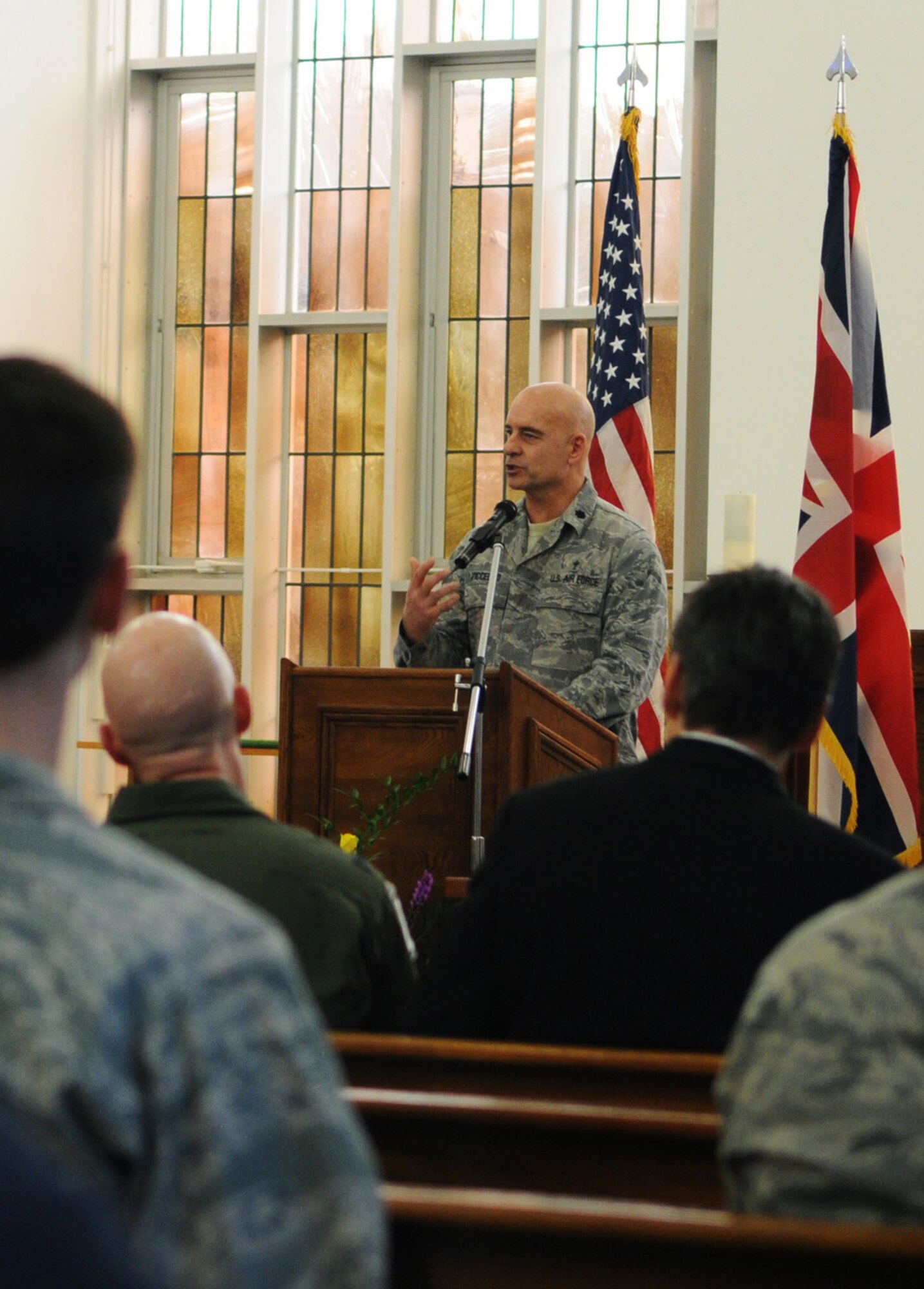 RAF MILDENHALL, England -- Chap. (Lt. Col.) Hodges Viccellio, 100th Air Refueling Wing chaplain, thanks the National Prayer Luncheon's guest speaker, Chap. (Maj. Gen.) Cecil Richardson, Air Force chief of chaplains, at the closing of the event Feb. 11, 2011. Airmen from all faiths were invited to the event that reminds them about their right to freedom of religion. (U.S. Air Force photo/Staff Sgt. Thomas Trower)