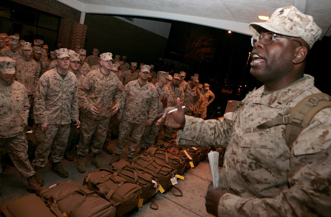 A Marine with 2nd Marine Logistics Group (Forward) briefs fellow Leathernecks and sailors on the morning's schedule prior to their departure at the French Creek Reception Center aboard Camp Lejeune, N.C., Feb. 15. The members of 2nd MLG (FWD) will embark on a year-long deployment to Afghanistan's Helmand province in support of International Security Assistance Force operations. (U.S. Marine Corps photo by Sgt. Justin J. Shemanski)
