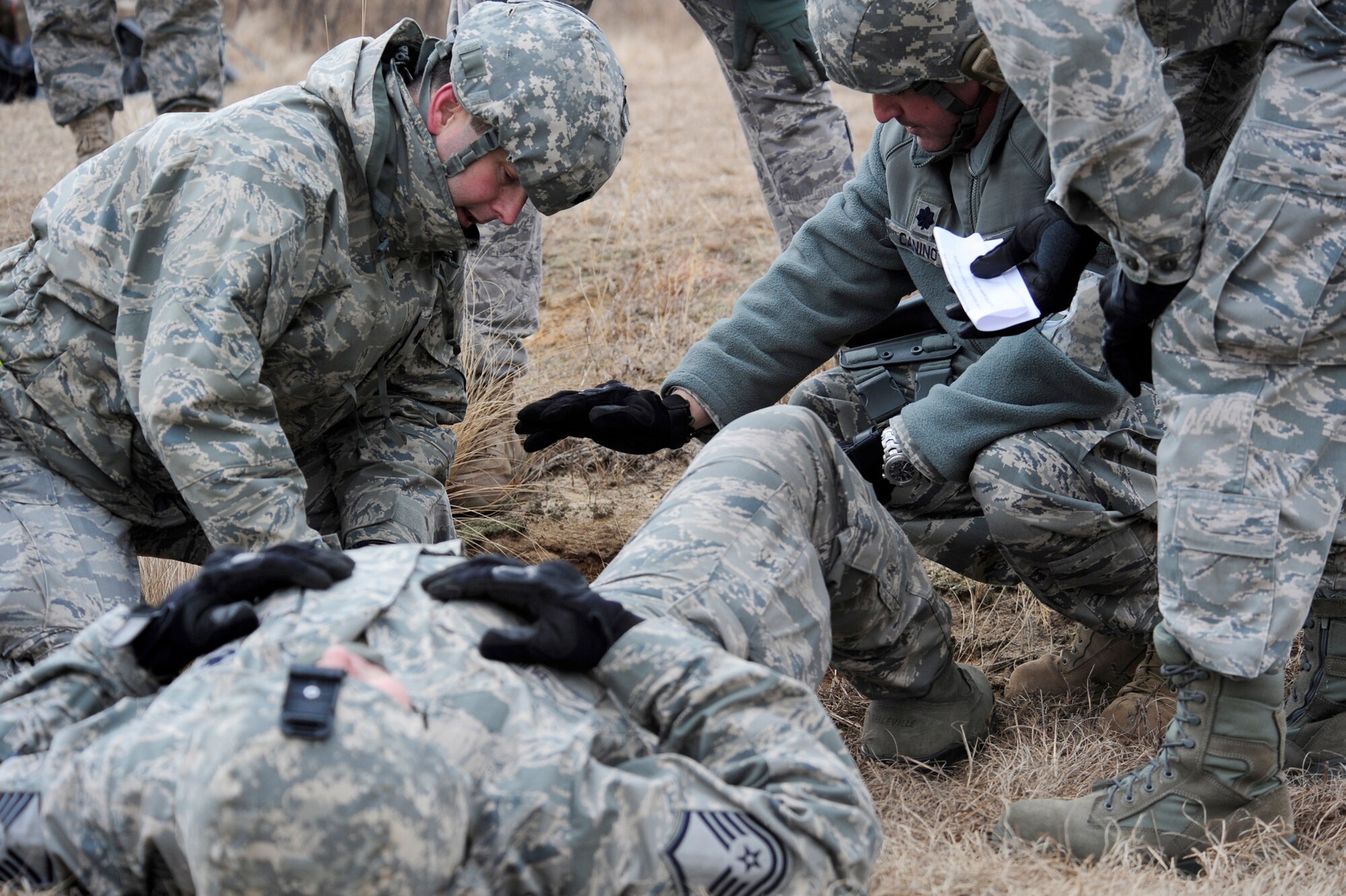 An Airman from the 570th Global Mobility Readiness Squadron "sets" a simulated compound fracture during a joint operational access exercise Feb. 10, 2011, near Fayetteville, N.C. (U.S. Air Force photo/Staff Sgt. Daniel Owen) 