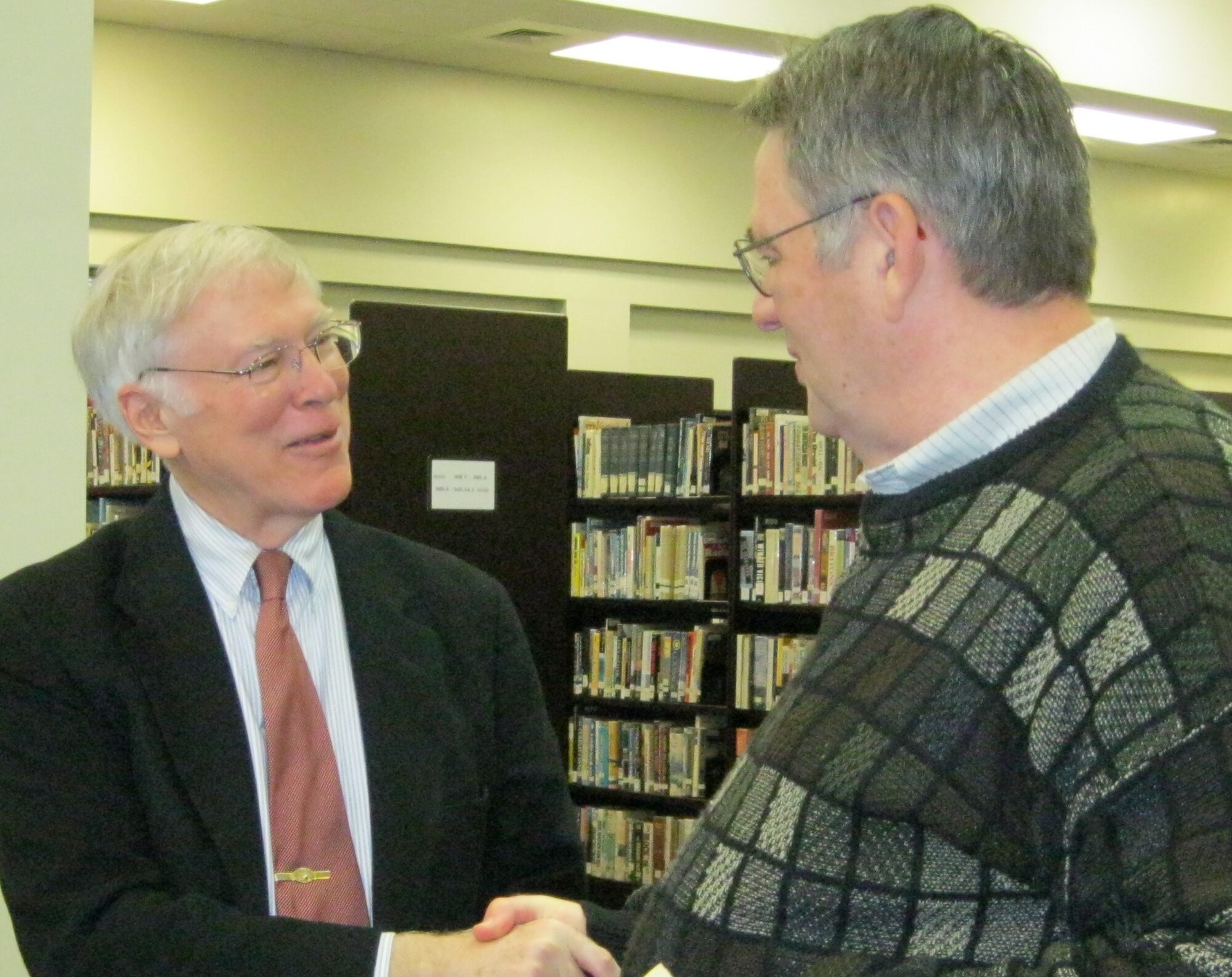 SEYMOUR JOHNSON AIR FORCE BASE, N.C. – (Left) Retired Army Lt. Col. Lewis "Bob" Sorley III, Vietnam veteran and author, shakes hands with Dr. Roy Heidicker, 4th Fighter Wing historian, after a discussion of the colonel’s book “A Better War” Feb. 8, 2011. Colonel Sorley spoke to members of the Seymour Johnson community about the Vietnam War and how different leaders affected the direction of the war effort. (U.S. Air Force photo/Tech. Sgt. Tammie Moore) (RELEASED)