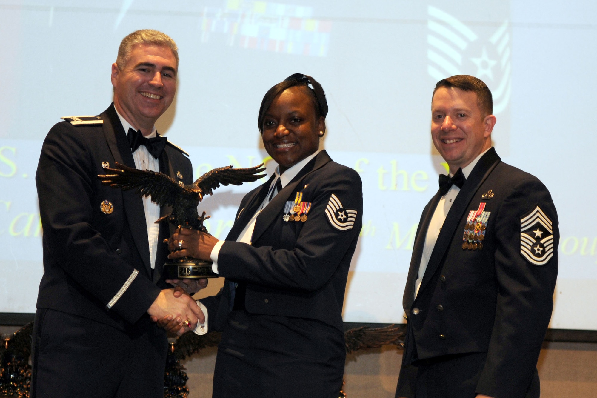 GOODFELLOW AIR FORCE BASE, Texas - Tech. Sgt. Camille Horton, 17th Medical Group, receives the Noncommissioned Officer of the Year Annual Award during the ceremony at the McNease Convention Center, San Angelo, Feb. 11, 2011. (U.S. Air Force photo/Staff Sgt. Heather Rodgers)

