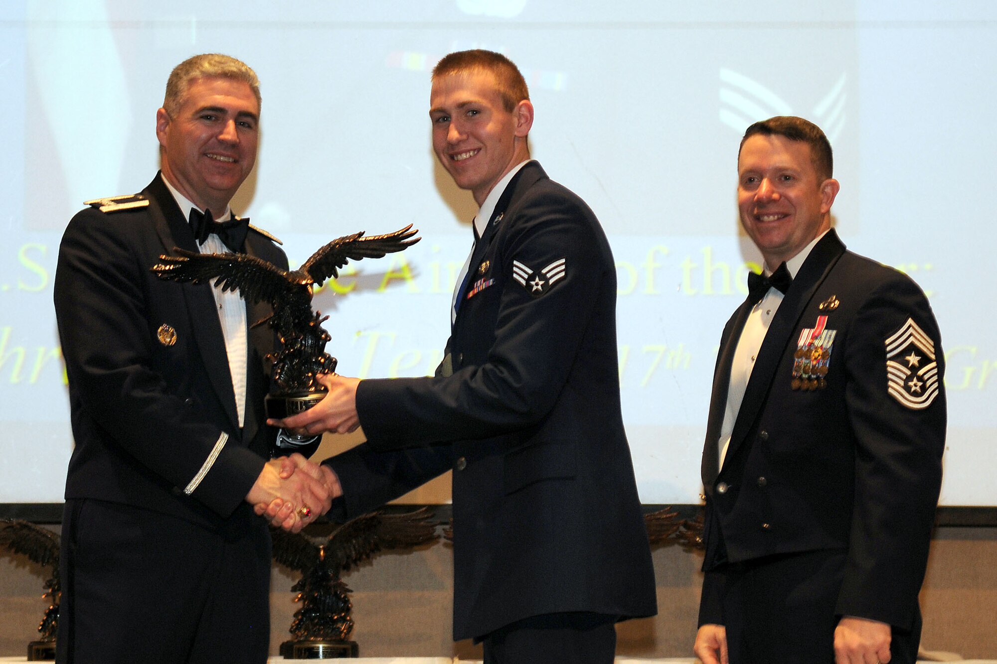 GOODFELLOW AIR FORCE BASE, Texas - Senior Airman Christopher Terrell, 17th Training Group, receives the Airman of the Year Annual Award during the ceremony at the McNease Convention Center, San Angelo Feb. 11, 2011. (U.S. Air Force photo/Staff Sgt. Heather Rodgers)