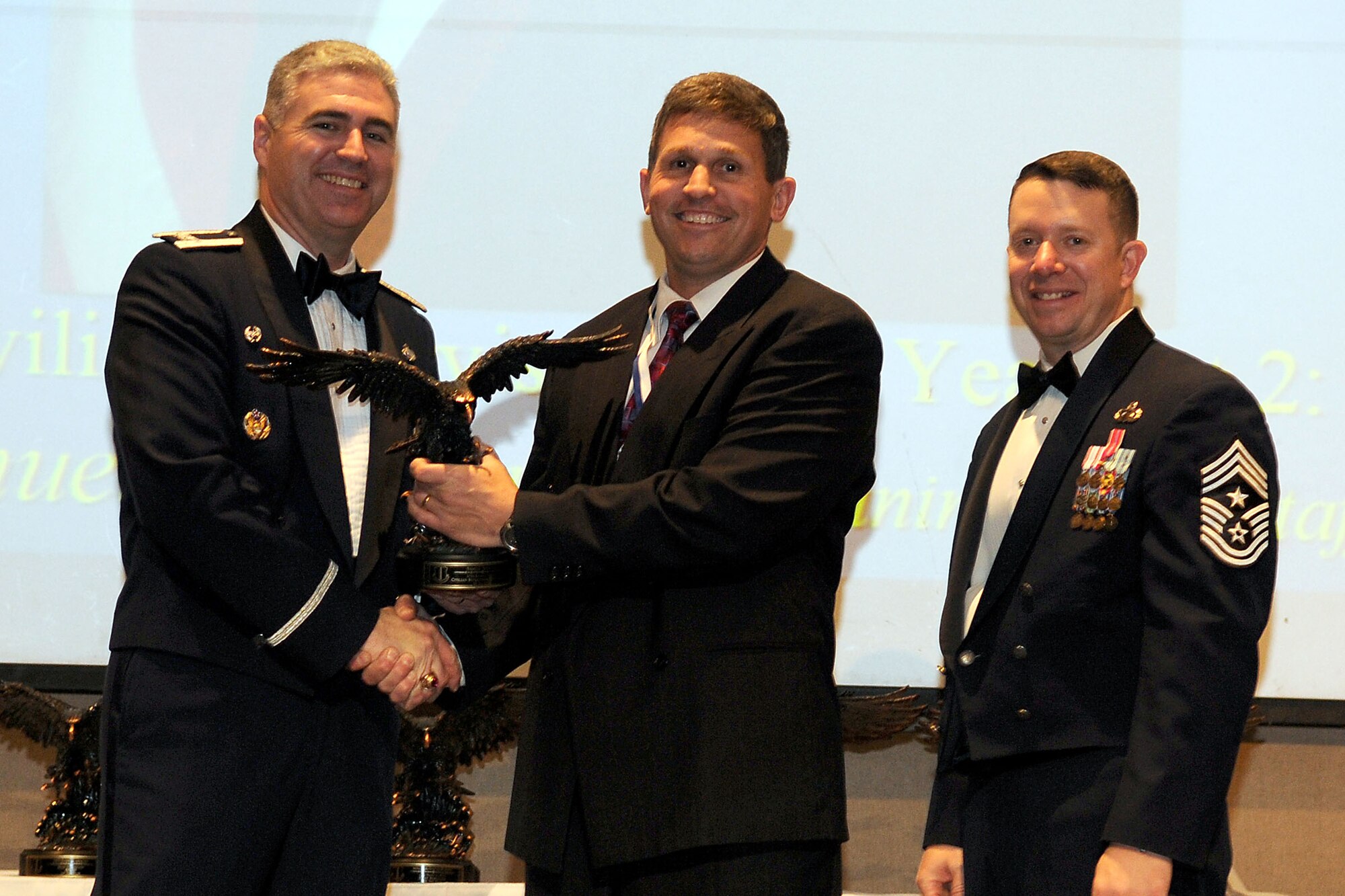 GOODFELLOW AIR FORCE BASE, Texas - Samuel Spooner, 17th Training Wing Safety, receives the Civilian Category 2 Supervisory Annual Award during the ceremony at the McNease Convention Center, San Angelo, Feb. 11, 2011. (U.S. Air Force photo/Staff Sgt. Heather Rodgers)