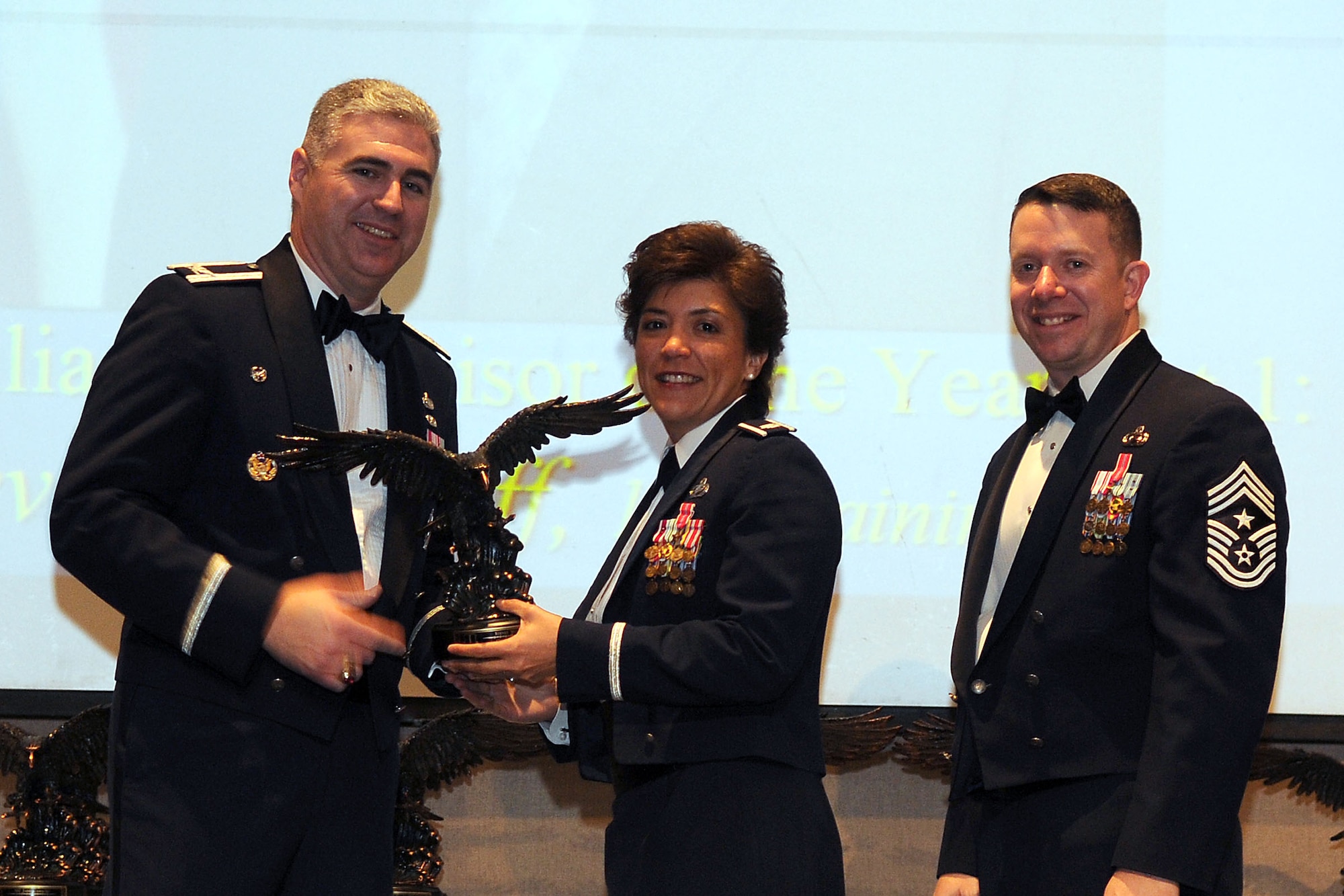 GOODFELLOW AIR FORCE BASE, Texas - Lt. Col. Karen Rolirad, 315th Training Squadron Commander receives the Civilian Category 1 Supervisory Annual Award on behalf of Steven Workoff, 17th Training Group, during the ceremony at the McNease Convention Center, San Angelo, Feb. 11, 2011. (U.S. Air Force photo/Staff Sgt. Heather Rodgers)