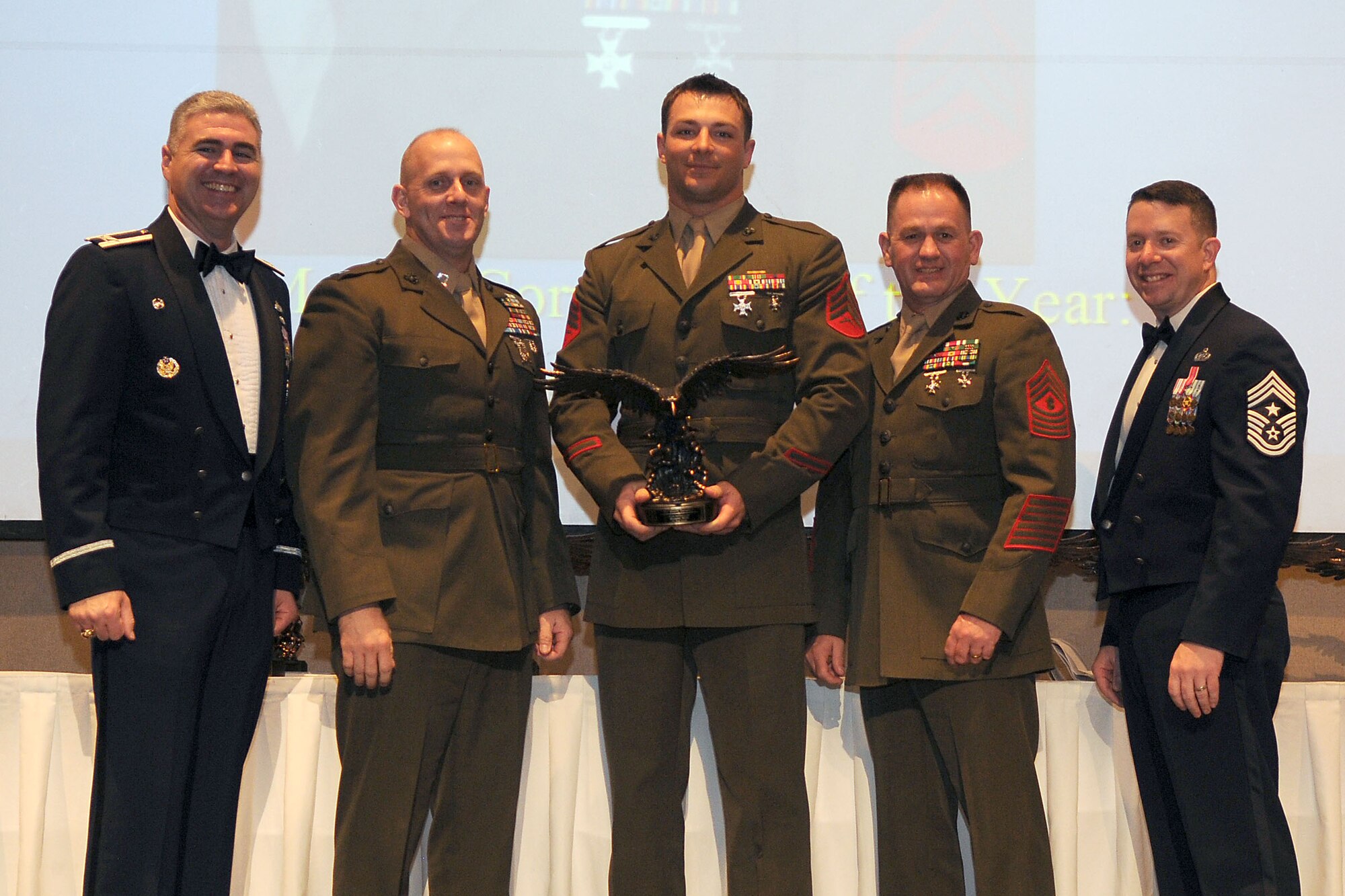 Marine Sgt. Mason Thompson, Marine Corps Detachment, receives the Noncommissioned Officer of the Year award, during the Annual Awards ceremony at the McNease Convention Center, San Angelo, Texas, Feb. 11, 2011. (U.S. Air Force photo/Staff Sgt. Heather Rodgers)