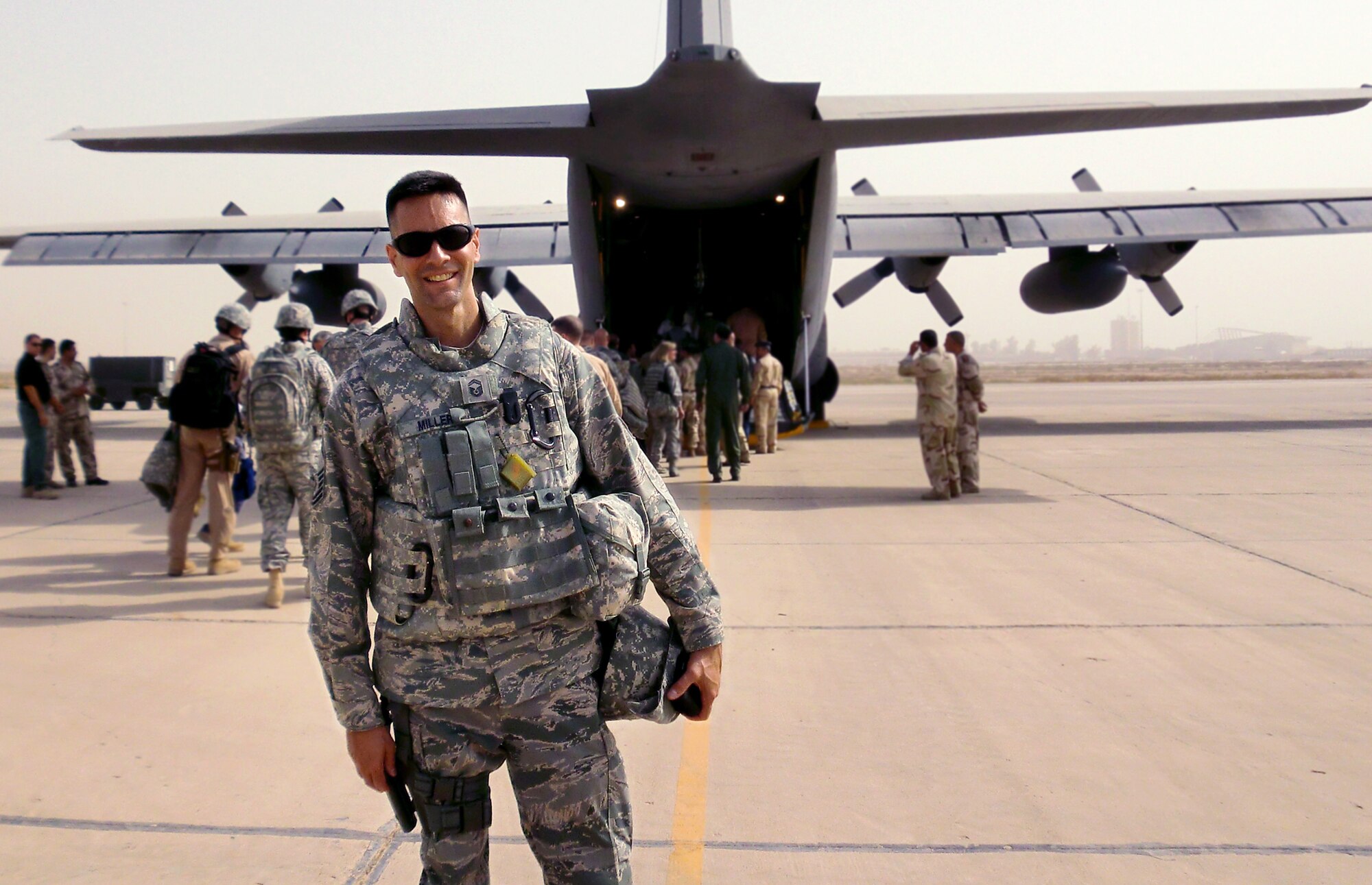 Senior Master Sgt. Dean Miller prepares to board an Iraqi C-130 Sept. 21, 2010, on New Al Muthana Air Base, Iraq. Sergeant Miller is the 62nd Airlift Wing chief of public affairs. (Courtesy photo)