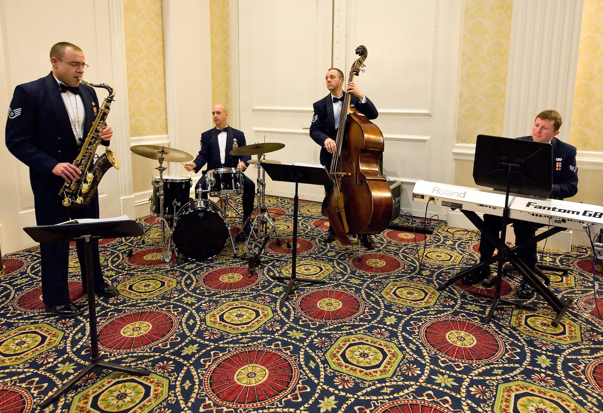 Members of the Air Force Heritage Band of America, Langley Air Force Base, Va., entertain guests during the 436th Airlift Wing 2010 Annual Awards Banquet Feb. 11, 2011, Dover Downs, Dover, Del. (U.S. Air Force photo/Roland Balik)  