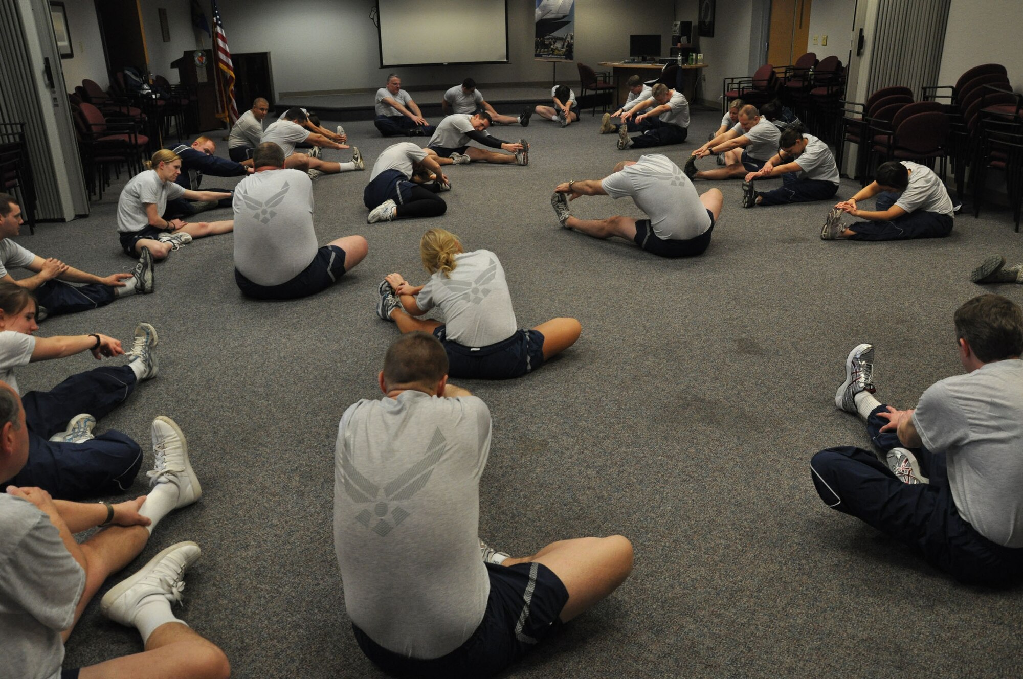 WRIGHT-PATTERSON AIR FORCE BASE, Ohio – Reservists from the 445th Aeromedical Evacuation Squadron stretch out before beginning their physical training workout at the start of the Feb.12 unit training assembly. (U.S. Air Force photo/Tech. Sgt. Anthony Springer)