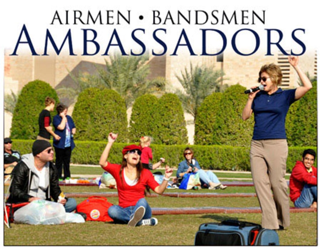 Starlifter vocalist Airman 1st Class Carmen Emborski getting down with the crowd at an undisclosed location in Southwest Asia. (Photo courtesy of Staff. Sgt Anthony T. Graham)
