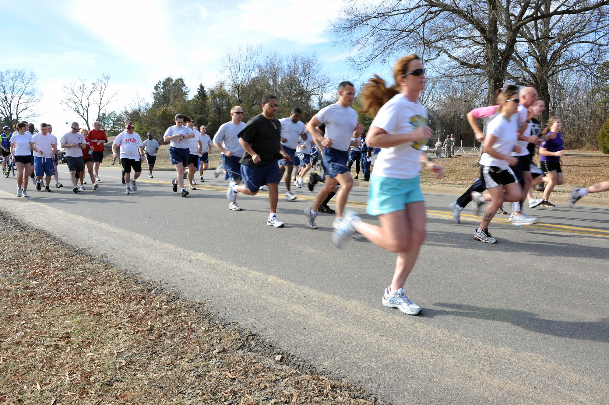 Team Little Rock members participate in the Sweetheart Poker 5-km run and walk Feb. 14, 2011, at Little Rock Air Force Base, Ark. The fitness center has themed fun runs every month, which are free and open to everyone with access to the base.  (U.S. Air Force photo by Staff Sgt. Chris Willis)