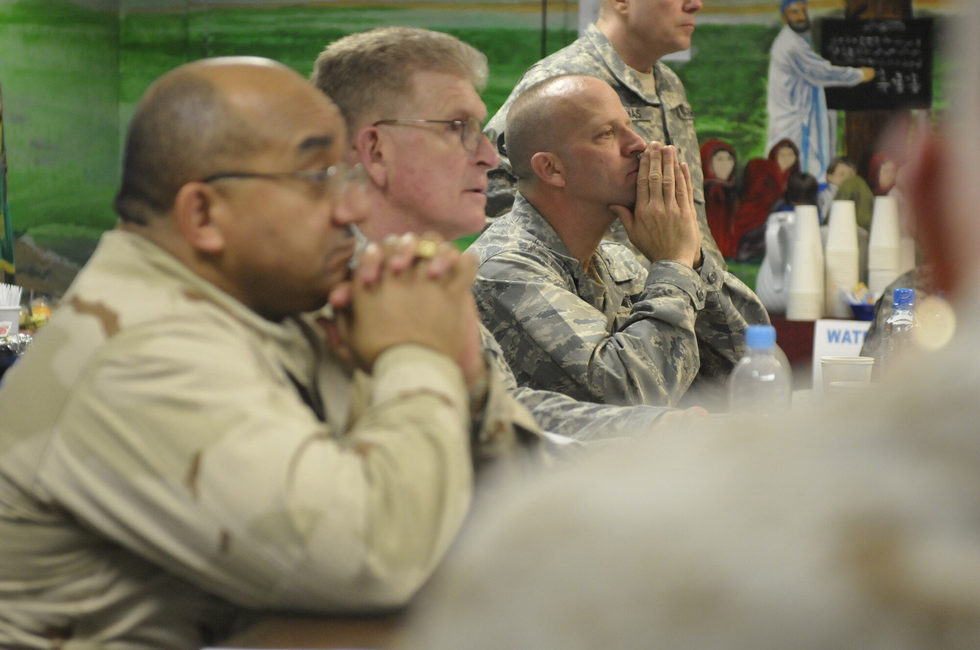 Department of Defense Surgeon Generals U.S. Navy Vice Adm. Adam M. Robinson Jr.  and U.S. Army Lt. Gen. Eric B. Schoomaker receive a medical capabilities briefing during their visit to the Craig Joint Theater Hospital, Bagram Airfield, Afghanistan, Feb. 13, 2011. The surgeon general's tour allowed them the opportunity to look at ways of helping medics operating day-in and day-out in the field to achieve more inoperability and ensure they had the necessary resources to provide the best care possible. (U.S. Air Force photo by Tech. Sgt. Michael Voss)