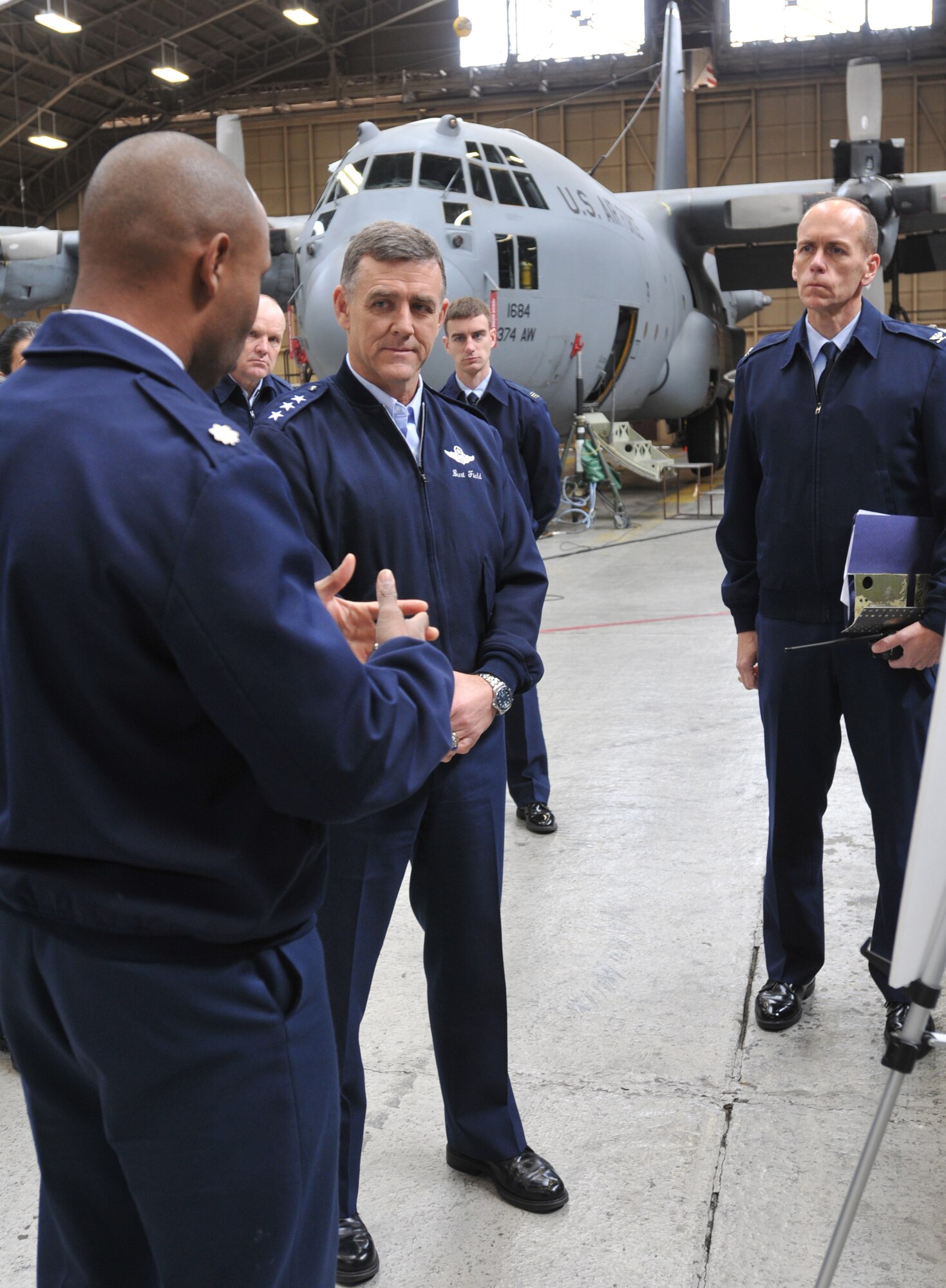 YOKOTA AIR BASE, Japan -- Lt. Col. Michael Edwards, 374th Aircraft Maintenance Squadron commander (left), explains the mission, aircraft maintenance unit, support flight, main objectives, and challenges associated with the squadron to Gen. Burton Field, U.S. Forces Japan and 5th Air Force commander, Pacific Air Forces, during a visit here Feb. 14. (U.S. Air Force photo/Airman 1st Class Krystal M. Garrett)