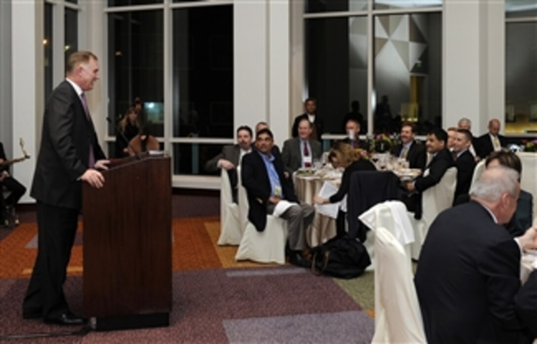 Deputy Secretary of Defense William J. Lynn III gives his remarks at an Executive Security Action dinner in San Francisco, Calif., on Feb. 14, 2007.  