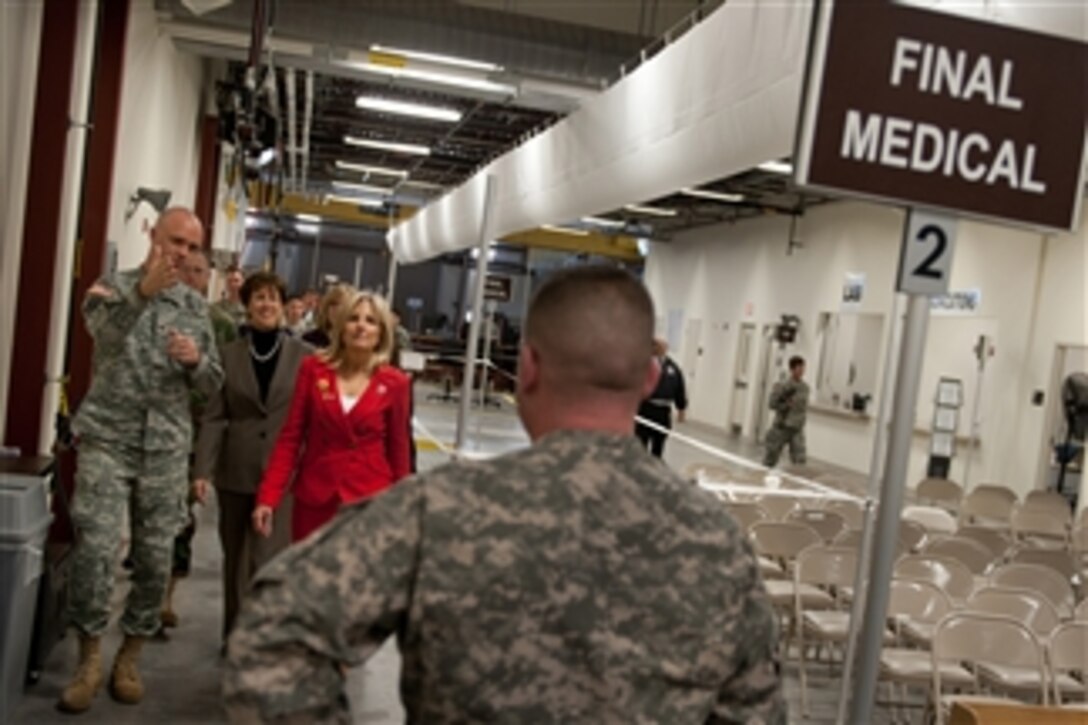 Jill Biden, wife of Vice President Joe Biden, and Sheila Casey, wife of the Chief of Staff of the Army Gen. George W. Casey Jr., are given a tour of the Soldier Readiness Processing Site at Fort Stewart, Ga., on Feb. 14, 2011.  The site qualifies soldiers for pending deployments through several different examinations, evaluations and interviews.  