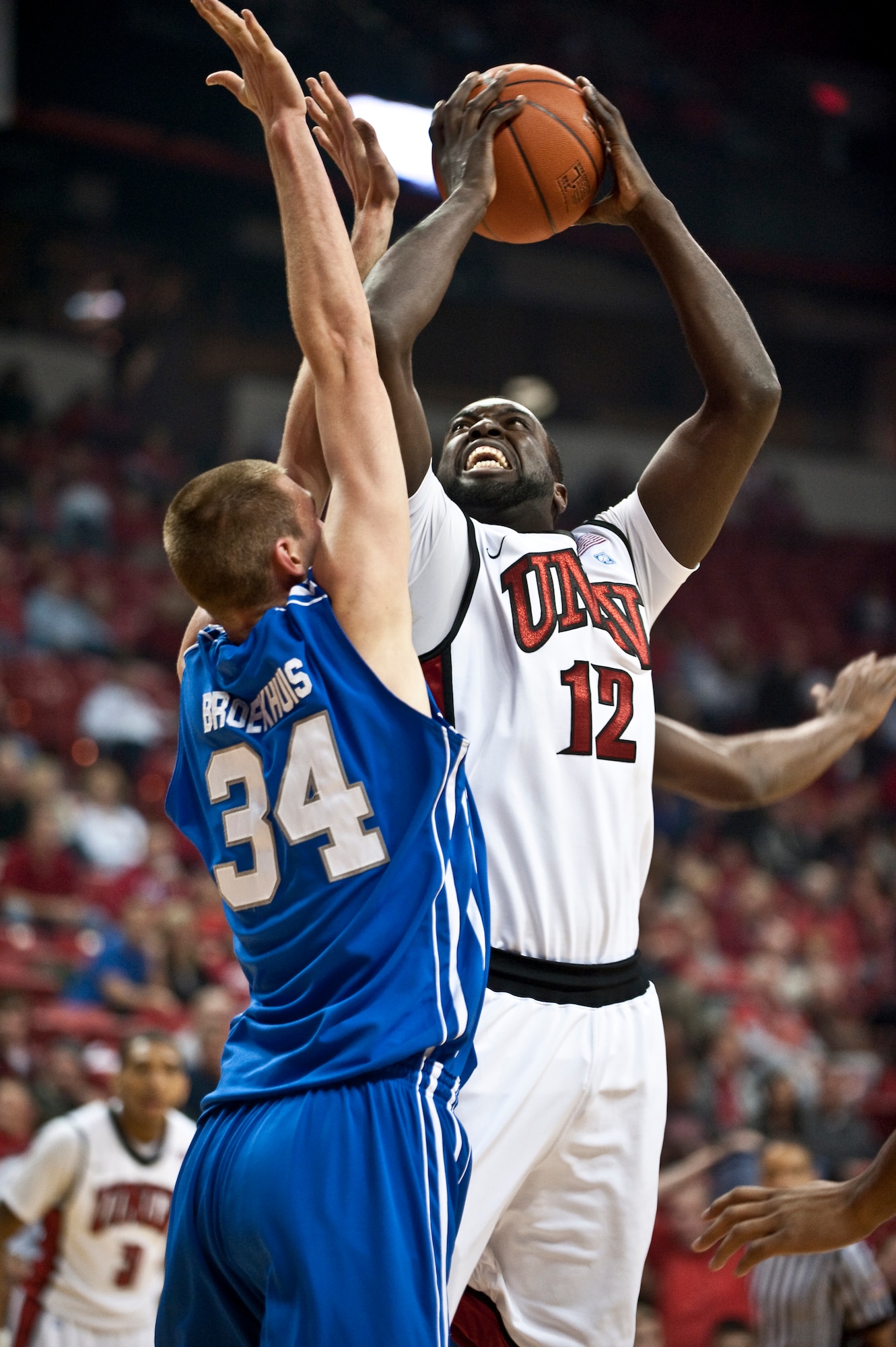 LAS VEGAS --  Taylor Broekhuis, U.S. Air Force Academy "Falcons" sophomore center, plays defense against Brice Massamba, University of Nevada Las Vegas "Runnin' Rebels" junior center at the Thomas and Mac Center Feb. 15. The Air Force Falcons came up short against  UNLV 49-42, making their record 13-11 overall and 4-7 in the Mountain West Conference. (U.S. Air Force photo by Tech Sgt. Michael R. Holzworth)
