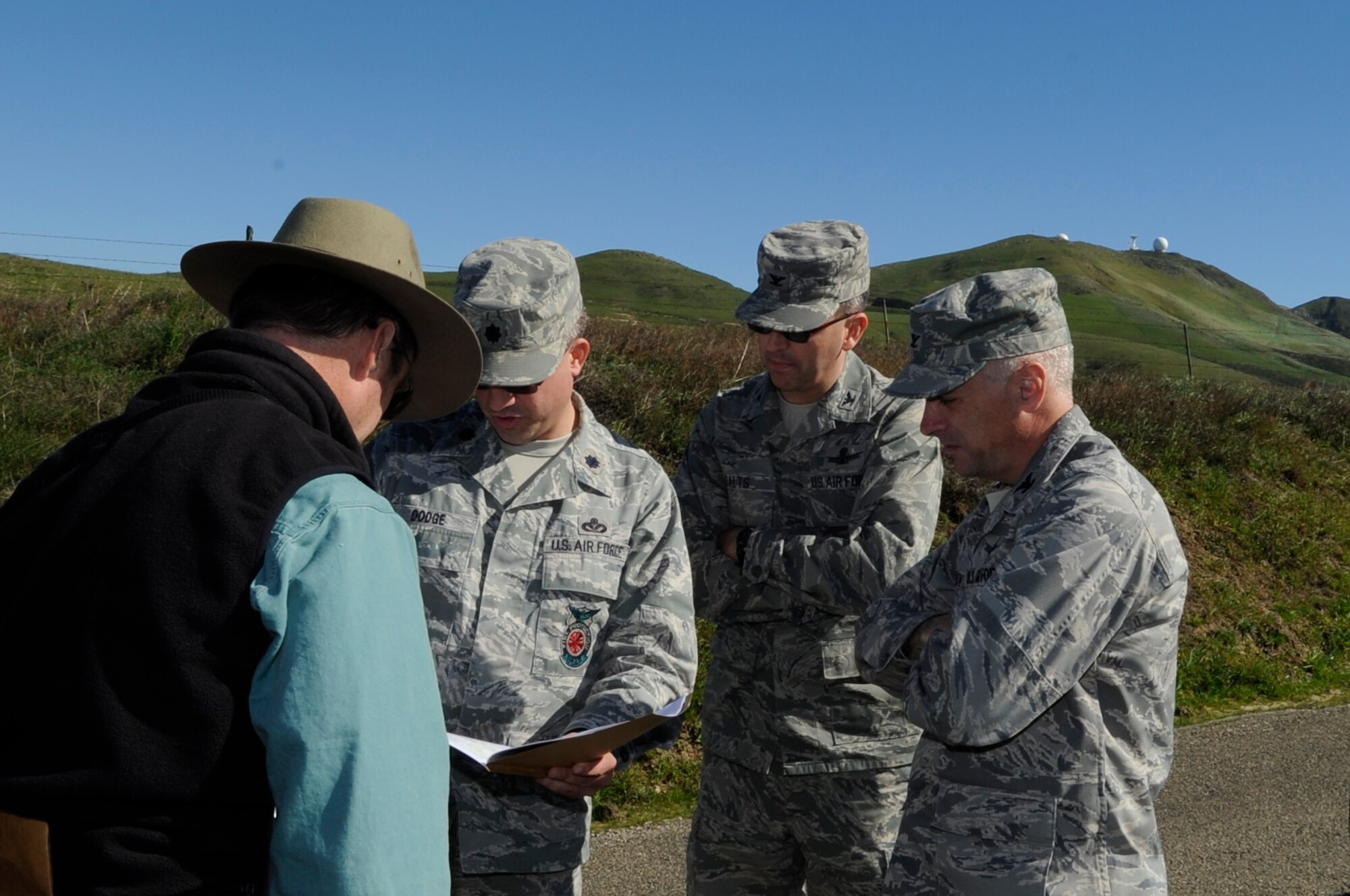 VANDENBERG AIR FORCE BASE, Calif. – Lt. Col.Timothy Dodge, the 30th Civil Engineer Squadron commander, discusses the location of a proposed wind farm with Col. Richard Boltz, the 30th Space Wing commander, and Col. Keith Balts, the 30th SW vice commander, here Wednesday, Feb. 9, 2011. The base’s wind turbine project is slated to take place near Upper Honda Canyon. (U.S. Air Force photo/Airman 1st Class Lael Huss)