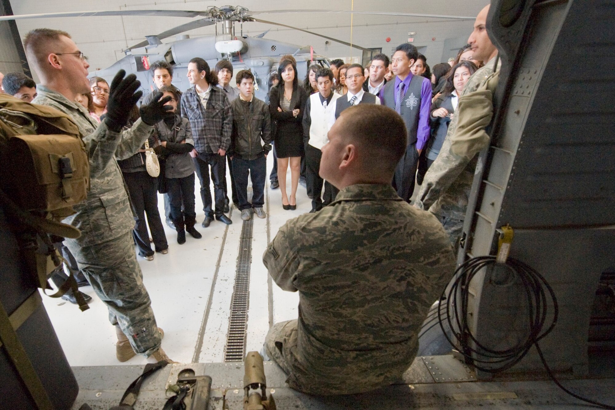 NELLIS AIR FORCE BASE, Nev.-- Aircrew members from the 763rd Maintenance Squadron
describe their occupations, responsibilities and aircraft to students during the National Job Shadow Day Feb. 2. The 763rd Maintenance Squadron was one of three squadrons at Nellis that participated in National Job Shadow Day, a program created to help lower the high school dropout rate for youth across the U.S. (U.S. Air Force photo by Airman 1st Class Jamie Nicley)
