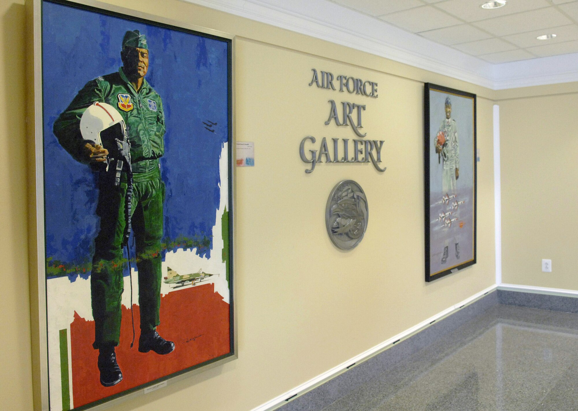 Examples of the artwork unveiled at the Roy LaGrone art exhibit at the AF Art  Gallery  Feb 15, 2011, in the Pentagon. Mr. LaGrone was a Tuskegee Airman before pursuing a career in art. (U.S. Air Force photo/Staff Sgt. Tiffany Trojca)
