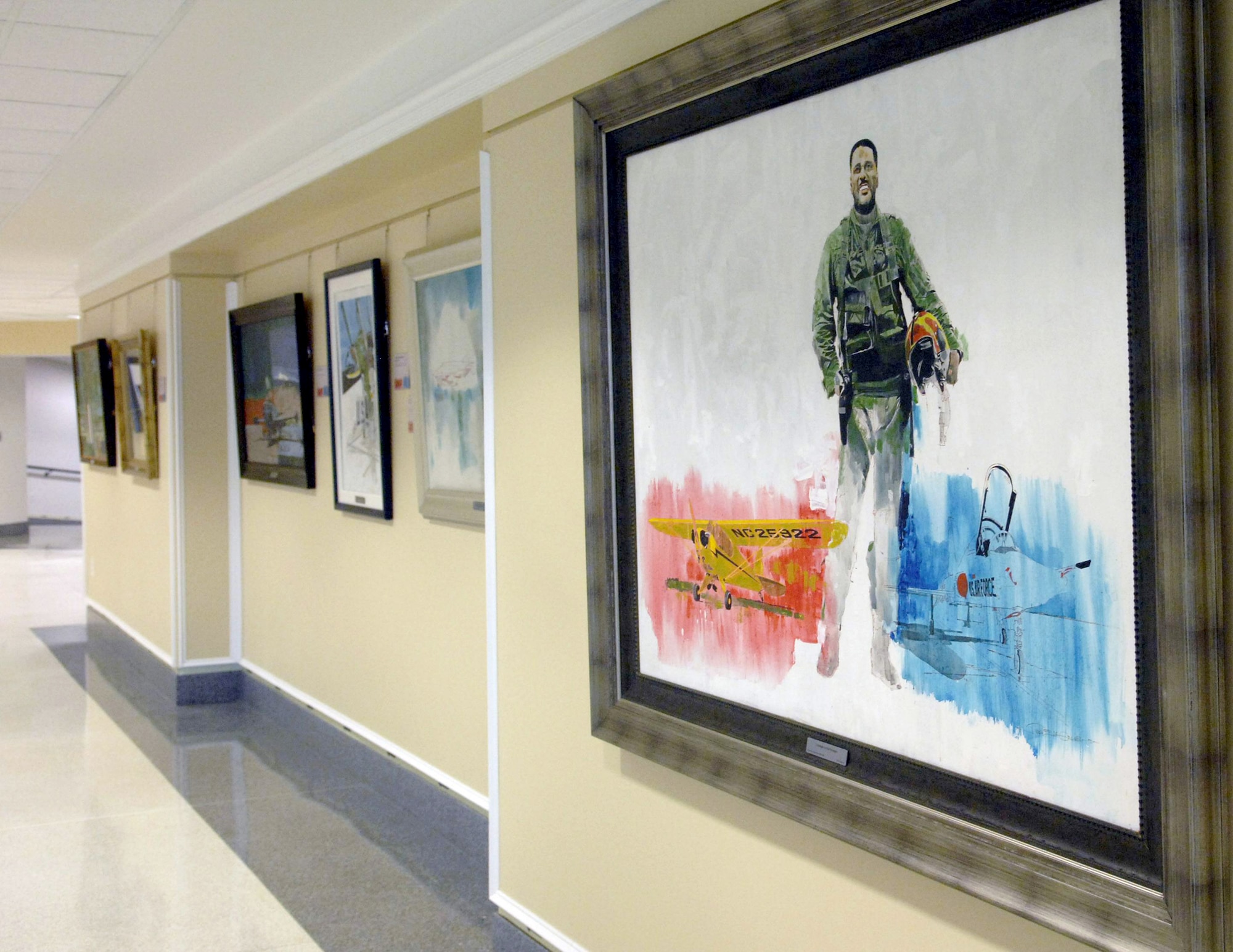 Examples of the artwork unveiled at the Roy LaGrone art exhibit at the AF Art  Gallery  Feb 15, 2011, in the Pentagon. Mr. LaGrone was a Tuskegee Airman before pursuing a career in art. (U.S. Air Force photo/Staff Sgt. Tiffany Trojca)
