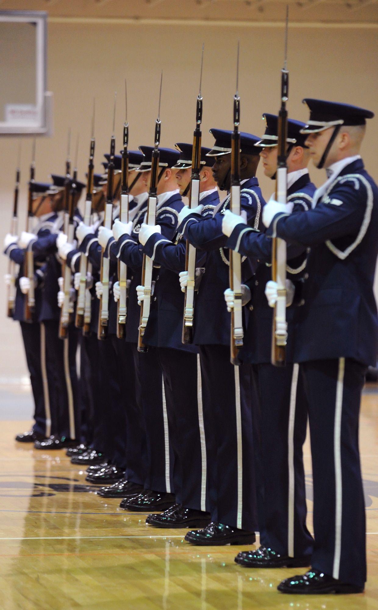 Members of the U.S. Air Force Honor Guard Drill Team perform Feb. 14, 2011, McConnell Air Force Base, Kan. The drill team visited Team McConnell during their travels to Tinker Air Force Base, Okla. The U.S. Air Force Honor Guard consists of three ceremonial flights, made up of Colors, Body Bearers, Firing Party and the Drill Team. (U.S. Air Force photo/Senior Airman Maria A. Ruiz)