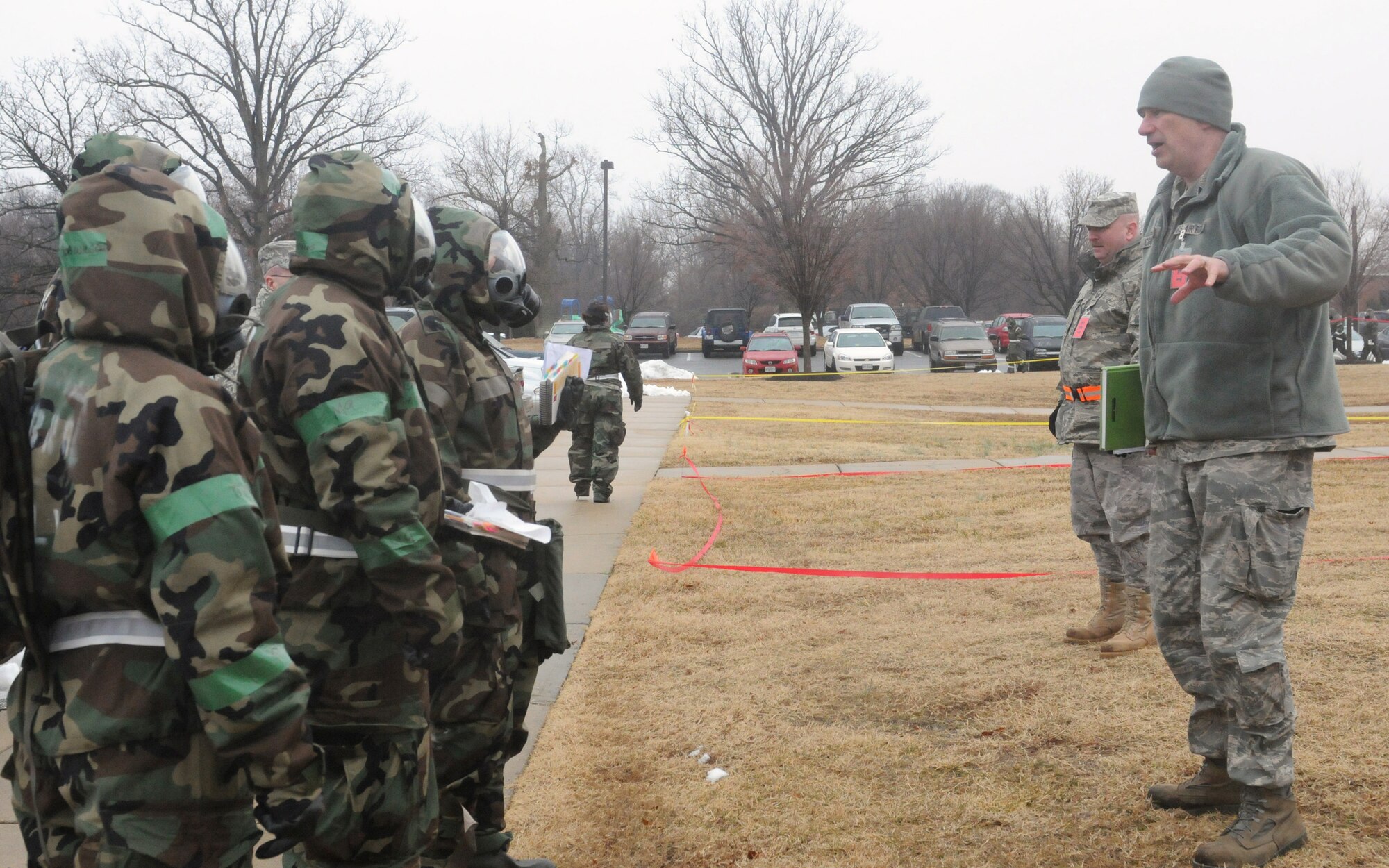 JOINT BASE ANDREWS, Md. -- Master Sgt. Charles Childers, 459th Civil Engineering Squadron Exercise and Evaluation Team member, discusses procedures for properly radioing in the position of simulated Unexploded Ordinance to 459th Air Refueling Wing Airmen Feb. 5 here. Along with recognizing UXOs, 459 ARW Reservists also faced scenarios like understanding alarm signals and donning Chemical Protective Overgarments during exercise Vantage Rally/Tiger Claw 11-01. (U.S. Air Force photo/Tech. Sgt. Steve Lewis)