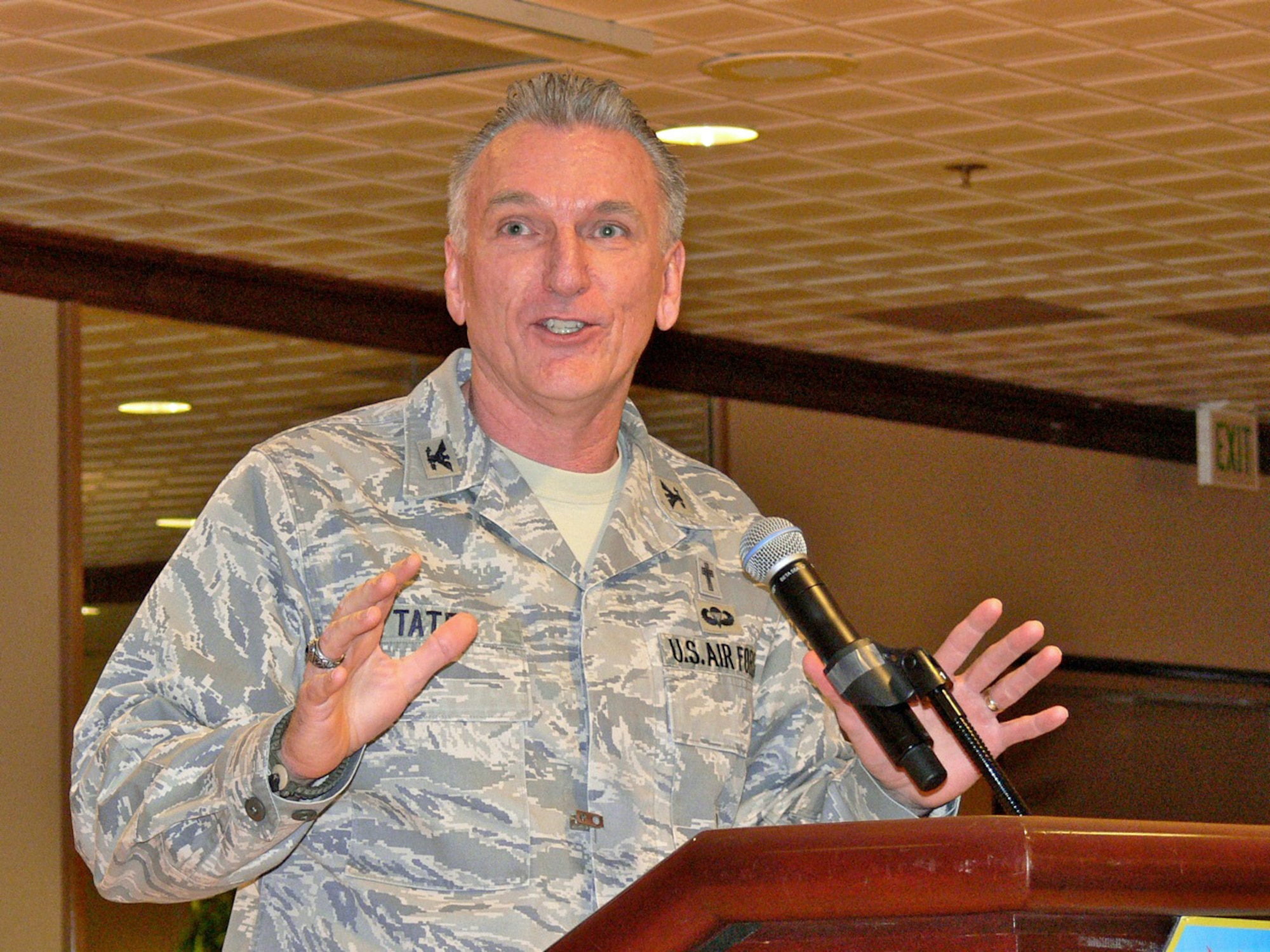 Chaplain (Col.) Gregory Tate, U.S. Air Force Space Command chaplain, told the Old Testament story of Gideon the mighty warrior and described how it parallels the story of the modern Airman, during the National Prayer Luncheon Feb. 10 at the Peterson Air Force Club. The National Prayer Breakfast dates back to 1953 when President Dwight D. Eisenhower established the first prayer breakfast for those who wish to come together to express themselves. (U.S. Air Force photo/Monica Mendoza)
