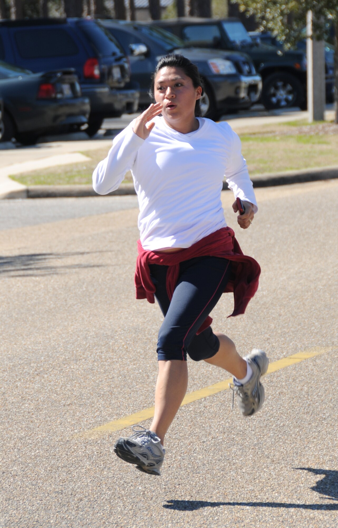 First place female runner was Elizabeth Cathey, 81st Force Support Squadron, 27:37.
Her husband is Senior Airman Isaac Cathey, 403rd Maintenance Squadron, who’s currently deployed to Afghanistan.  (U.S. Air Force photo by Kemberly Groue)