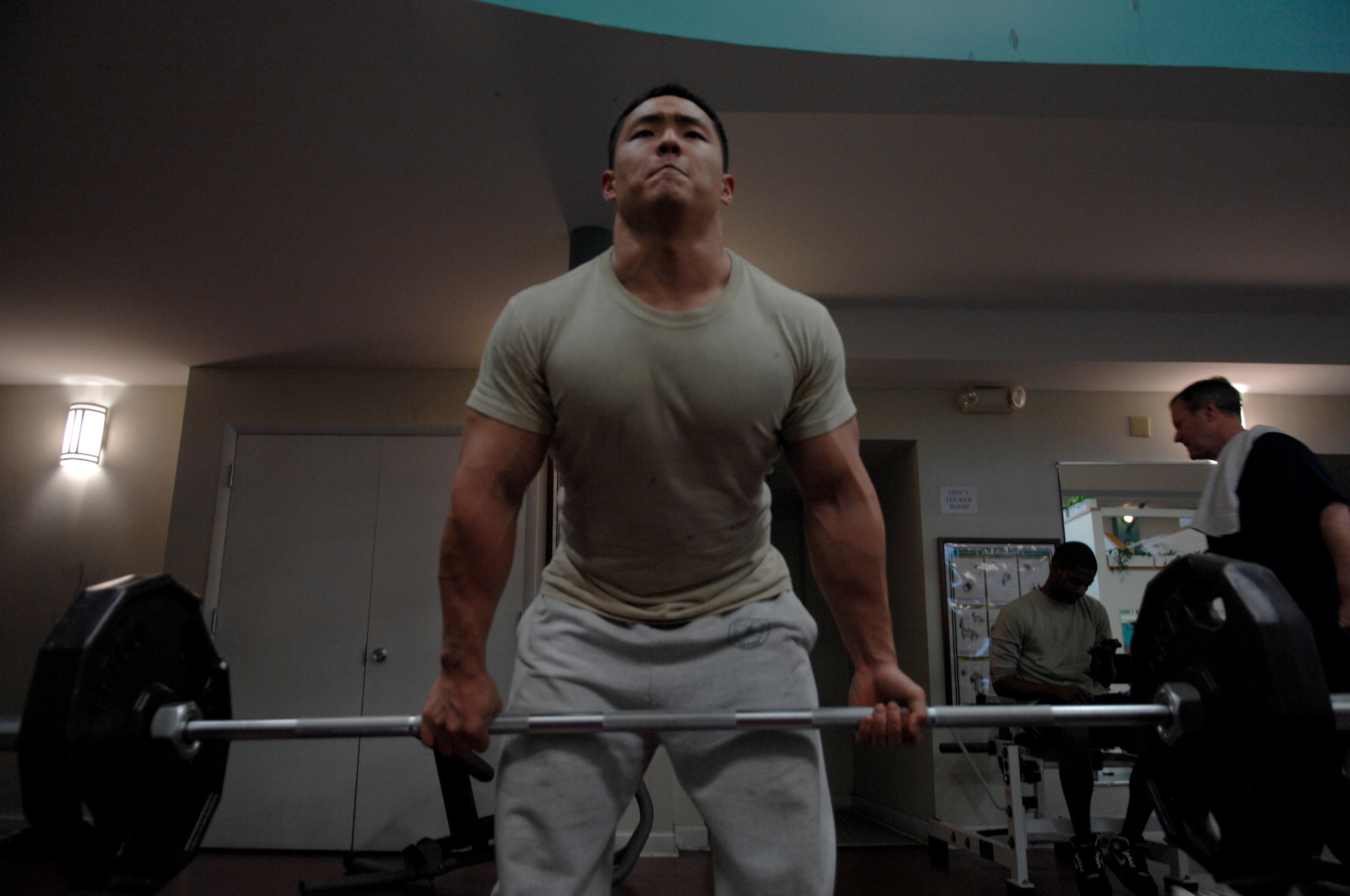 SCOTT AIR FORCE BASE, Ill. -- Senior Airman Henry Chung, 375th Logistics Readiness Squadron, works out Feb. 10 at Scott Air Force Base.  Airman Chung started working out after making a New Years resolution in 2007.(U.S. Air Force Photo by Senior Airman A,ber Kelly-Herard)