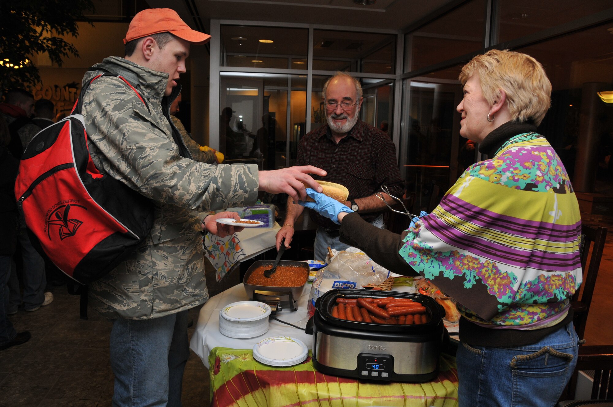 Sharon Simpson and her husband Keith offer up a warm and welcome meals to inbound Reservists Feb. 4 before the February UTA. (Air Force Photo/Tech. Sgt. Bob Sommer) 


