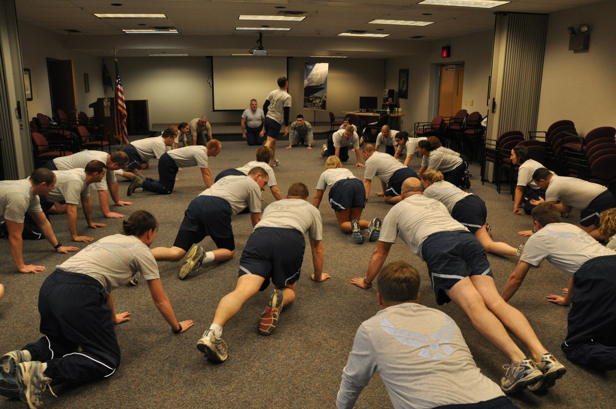 WRIGHT-PATTERSON AIR FORCE BASE, Ohio – Reservists from the 445th Aeromedical Evacuation Squadron stretch out before beginning their physical training workout at the start of the Feb.12 unit training assembly. (U.S. Air Force photo/Tech. Sgt. Anthony Springer)