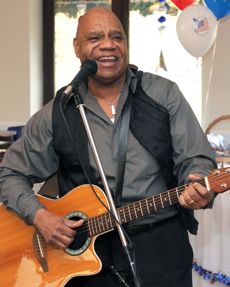 RAF ALCONBURY, United Kingdom - Freddie Hall entertains families during the 2011 Winter Deployed Family Night Out Feb. 12. The event focuses on giving support to servicemember's families who have a deployed family member. (U.S. Air Force photo by Staff Sgt. Joel Mease) 