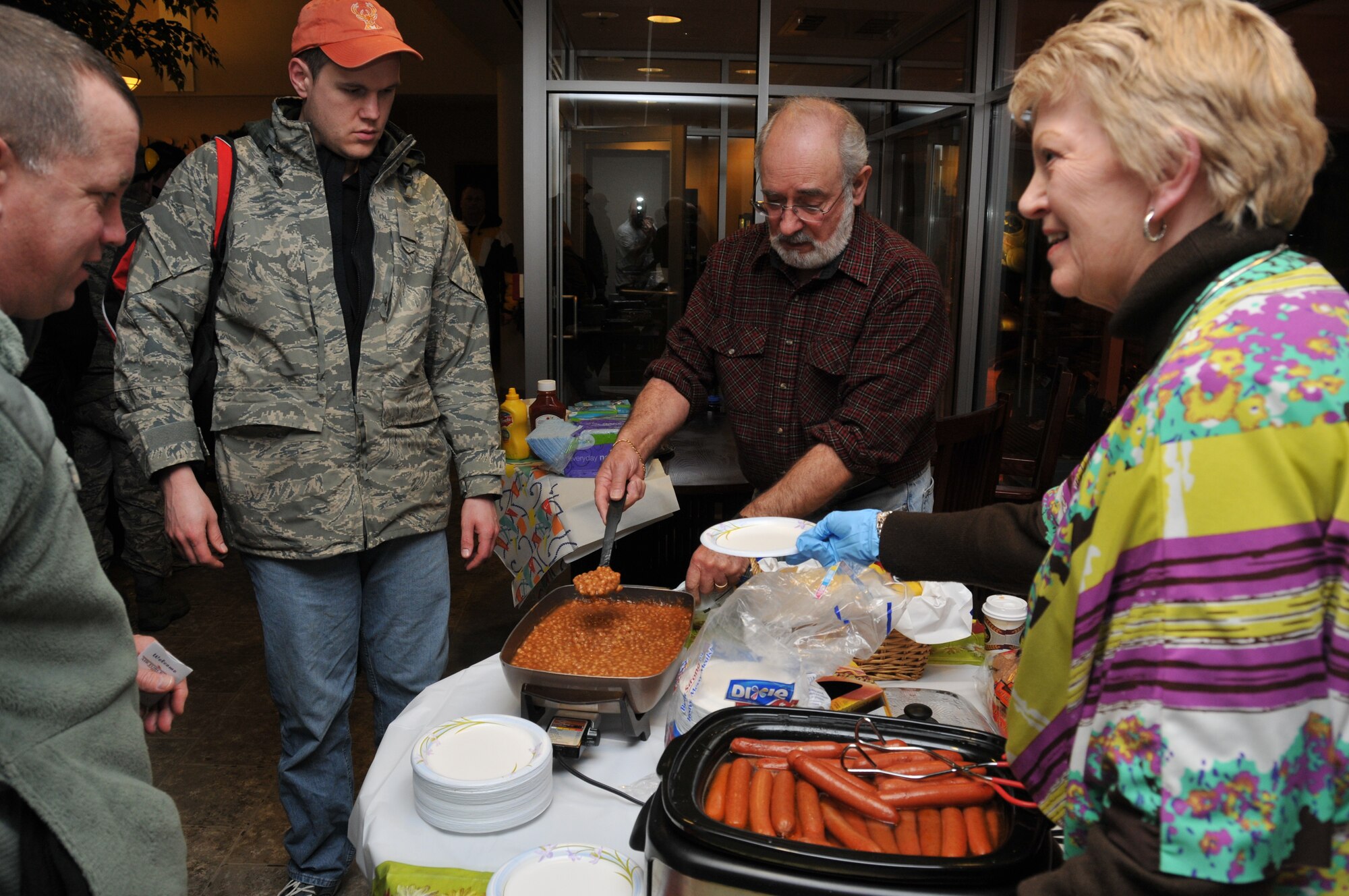 Sharon Simpson and her husband Keith offer up a warm and welcome meals to inbound Reservists Feb. 4 before the February UTA. (Air Force Photo/Tech. Sgt. Bob Sommer)