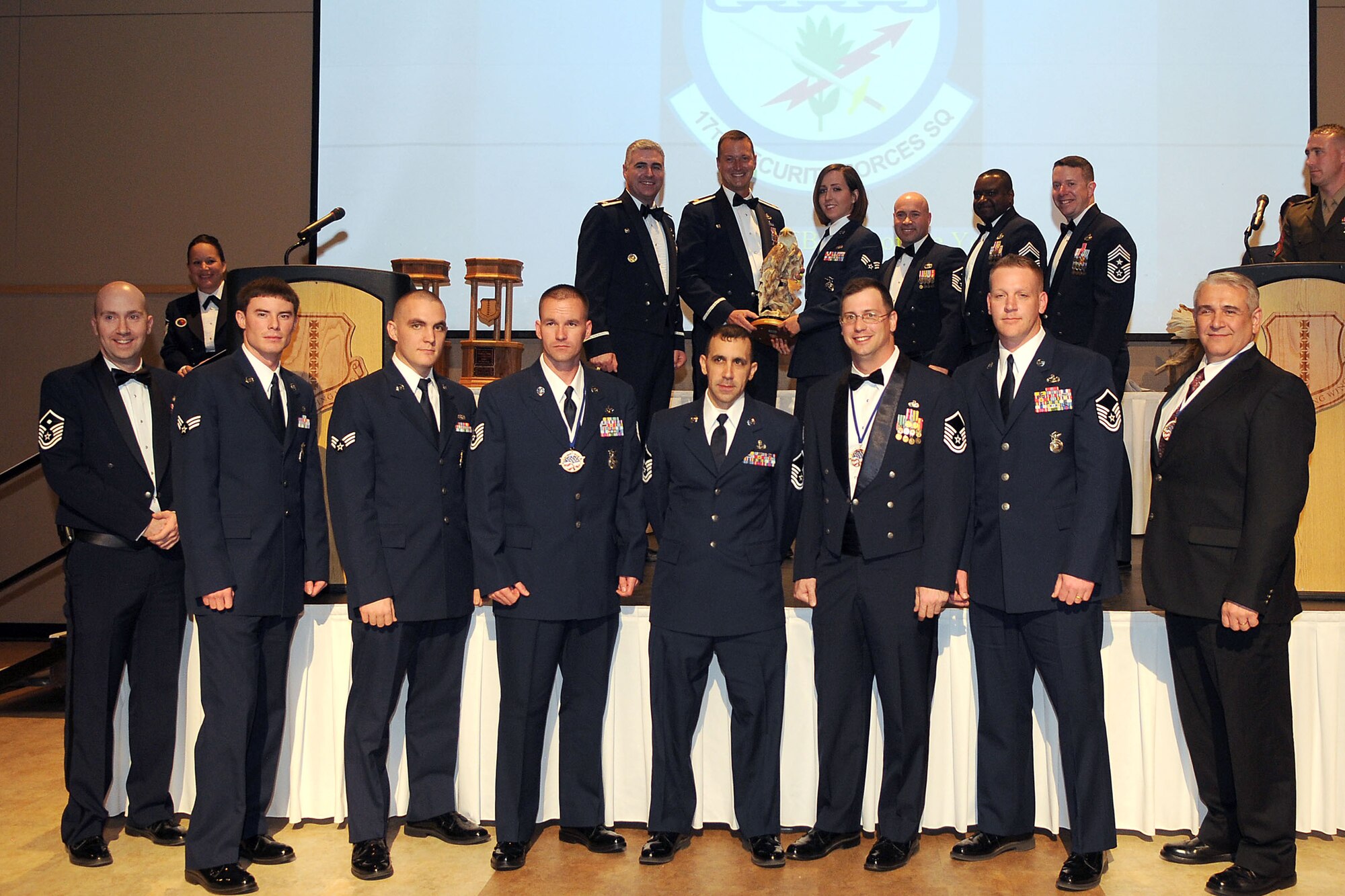 GOODFELLOW AIR FORCE BASE, Texas - 17th Security Forces Squadron members pose after receiving the Unit of the Year Annual Award during the ceremony, at the McNease Convention Center, San Angelo, Feb. 11, 2011. (U.S. Air Force photo/Staff Sgt. Heather Rodgers))