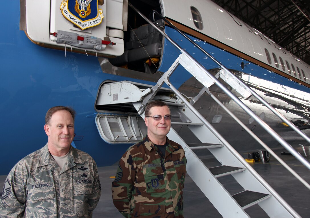 Master Sgts. Forbes Blackford (left) and Mark Spicer have nearly 50 years combined experience maintaining the C-9 aircraft.  Both reservists began their careers at the 932nd Maintenance Squadron when the C-9A model was used for aeromedical evacuation.  Today, they help maintain the C-9C which has been used for distinguished airlift (DV) at the 932nd Airlift Wing (Reserve) since 2005.  Also, each NCO has flown aboard many missions as the flying crew chief.  (U.S. Air Force photo/Tech. Sgt. Dan Oliver)
