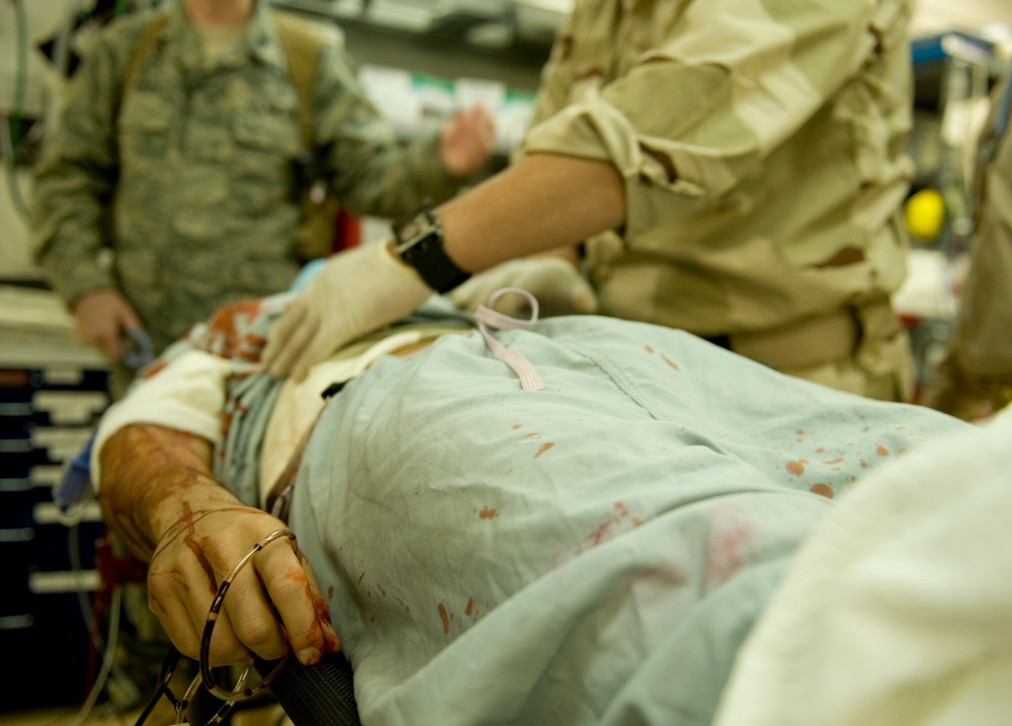 JOINT BASE BALAD, Iraq -- An Iraqi medic checks a mock trauma patient for internal injuries during a medical exercise Feb. 9. The training was part of a first responder workshop held for Iraqi medics to help develop skills to treat trauma patients. (U.S. Air Force photo by Staff Sgt. Levi Riendeau)