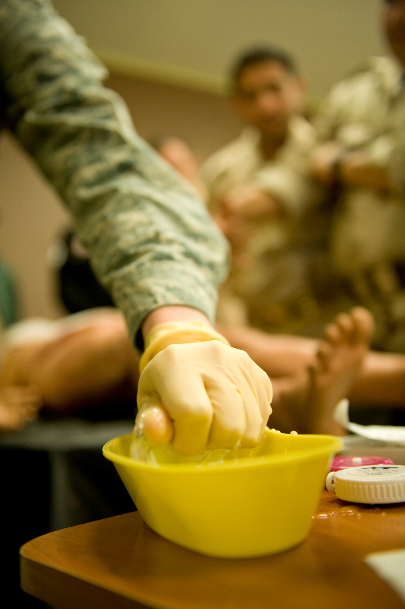 JOINT BASE BALAD, Iraq -- A  U.S. Air Force nurse with the 332nd Expeditionary Medical Group teaches Iraqi medics wound care Feb. 8. The training was part of a first responder workshop held for Iraqi medics to help develop skills to treat trauma patients. (U.S. Air Force photo by Staff Sgt. Levi Riendeau)
