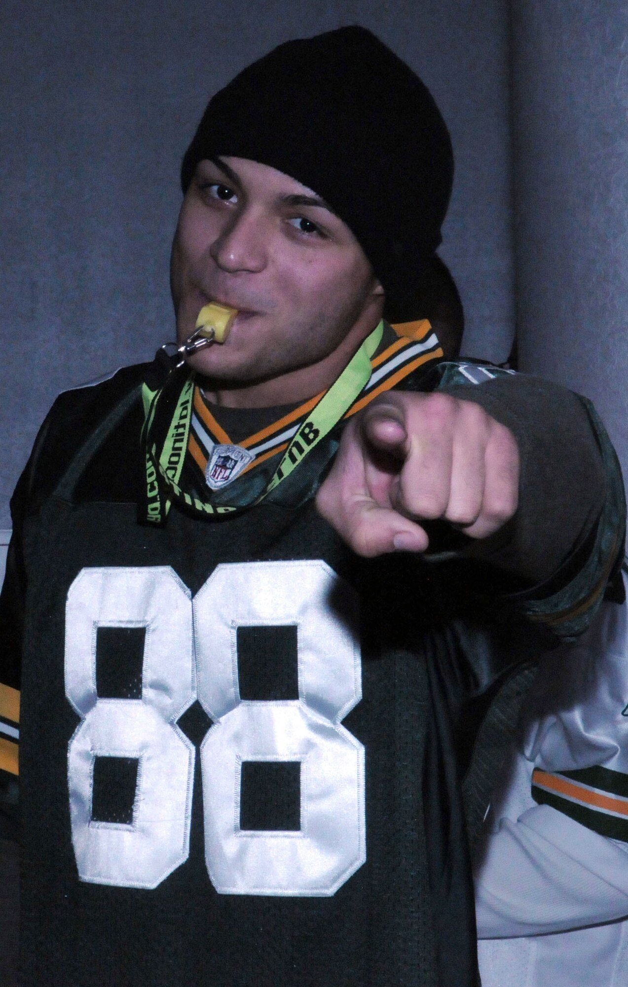 Senior Airman Joshua Rodriguez, 39th Communications Squadron, cheers for his team at the Super Bowl XLV screening event at the consolidated club, Feb. 6-7, 2011, at Incirlik Air Base, Turkey. The event allowed Airmen to see the live broadcast of the game and get a taste of home, said 39th Force Support Squadron officials. The event was also the finale of the Incirlik Super Bowl commercial contest. Attendees had the opportunity to view and vote for their favorite locally-produced commercial. The first place winner received $10,000 in quality-of-life funds for the unit. (U.S. Air Force photo by 1st Lt. Gina M. McKeen/Released)