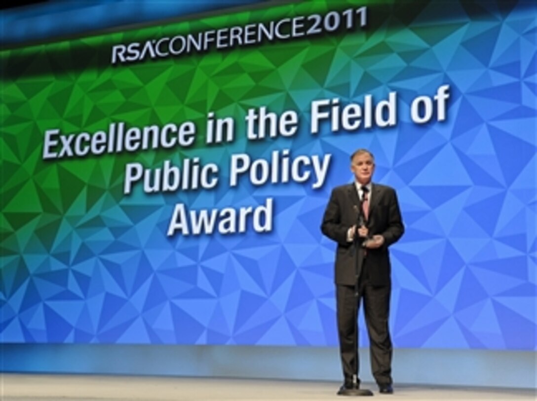 Deputy Secretary of Defense William J. Lynn III gives his remarks after receiving the Excellence in the Field of Public Policy Award at the 2011 RSA Conference in San Francisco, Calif., on Feb. 15, 2011.  