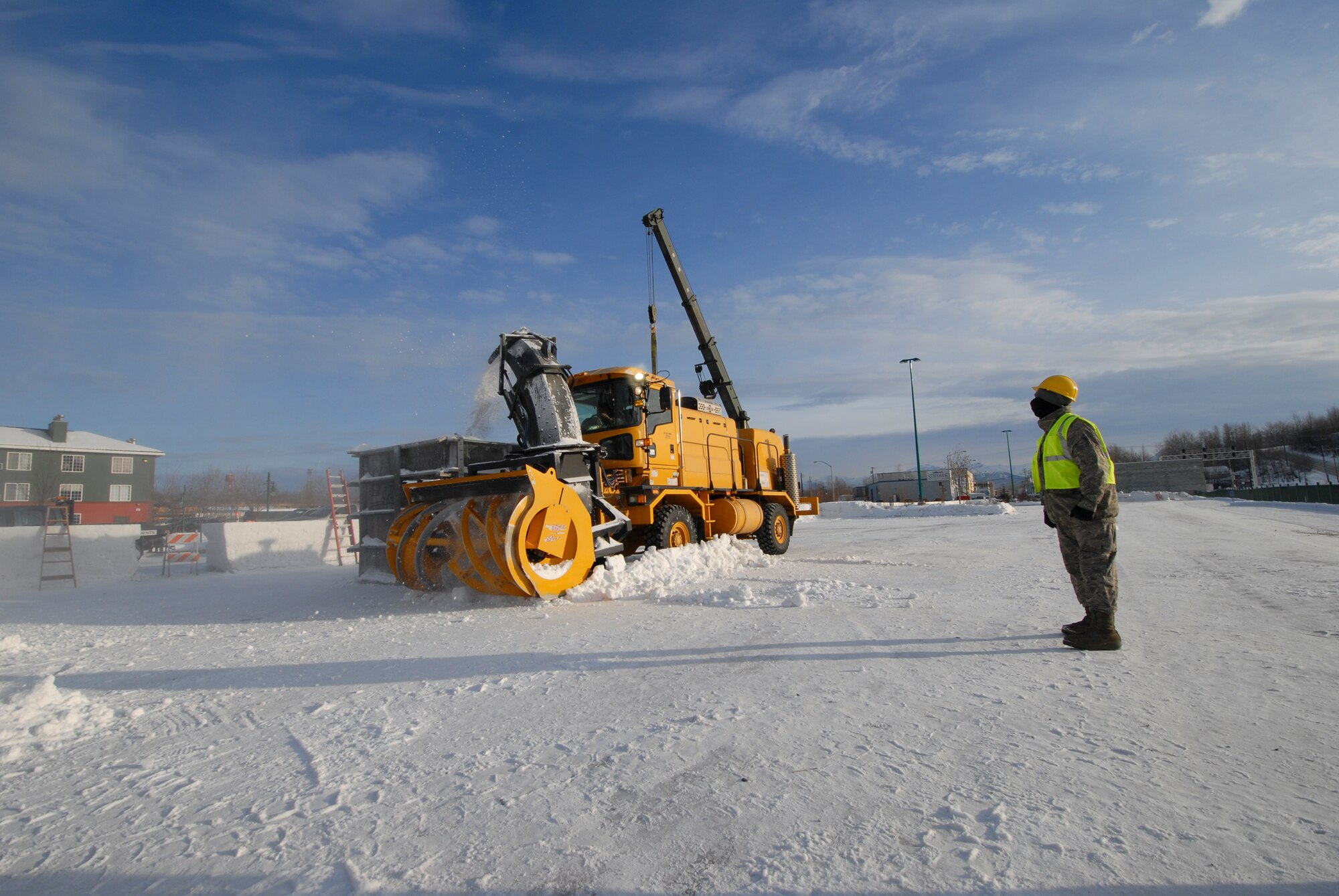 ANCHORAGE, Alaska -- Members of the 773rd Civil Engineer Group assigned to Joint Base Elmendorf-Richardson work to create snow blocks for the upcoming Fur Rendezvous Festival, a two-week celebration held annually in Anchorage. (Air Force photo by Steve White/JBER PAO)