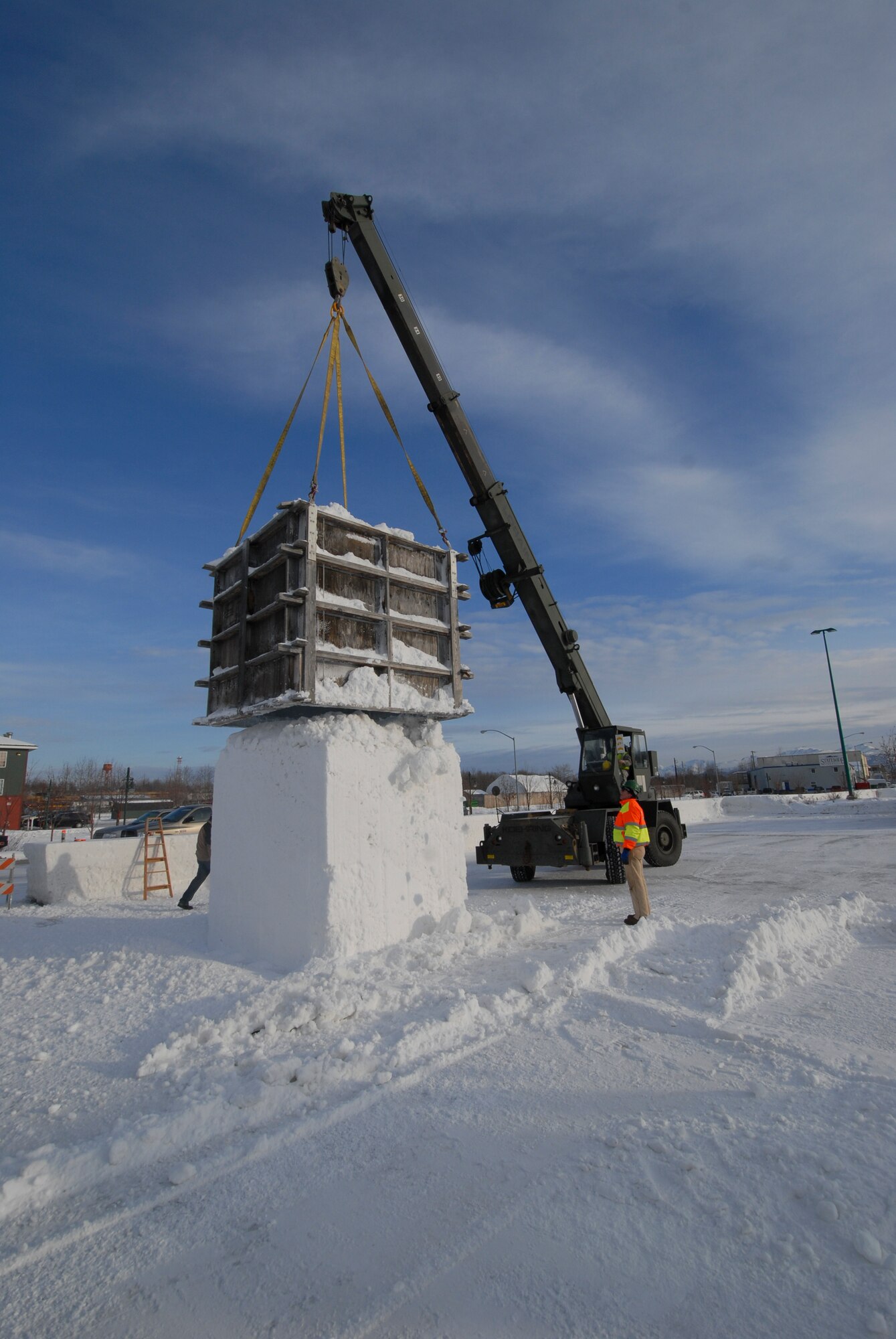 ANCHORAGE, Alaska -- Members of the 773rd Civil Engineer Group assigned to Joint Base Elmendorf-Richardson work to create snow blocks for the upcoming Fur Rendezvous Festival, a two-week celebration held annually in Anchorage. (Air Force photo by Steve White/JBER PAO)