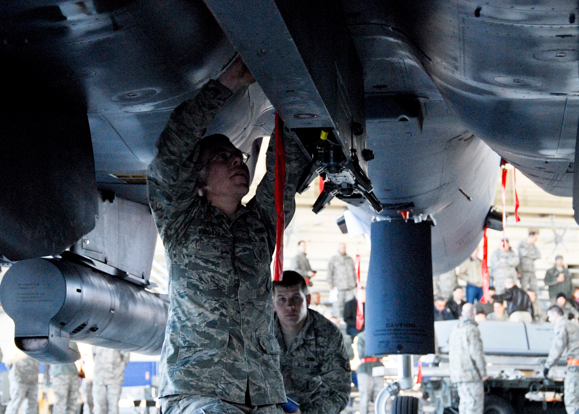 Senior Airman Michael Virostko, 46th Aircraft Maintenance Squadron participates in the Load Crew of the Year competition Feb. 11 at Eglin. Teams competed against each other to see who could properly load munitions on an F-16 quickest with the fewest errors.  Winners will be announced at the annual award banquet March 4.  (U.S. Air Force photo/Sachel Seabrook)