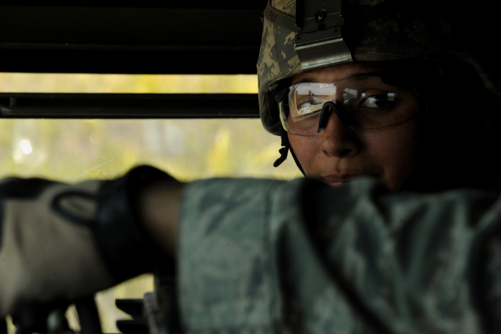 AVON PARK, Fla.-- Senior Airman Camille Espinoza-Rojas, 823rd Base Defense Squadron fire team leader,  leaves the mock village in a HUMVEE during joint exercise ATLANTIC STRIKE 11-01 Feb. 16. Airman Espinoza-Rojas was one of the two team leaders responsible for the Airmen from the 823rd BDS during the joint exercise. (U.S. Air Force photo/Airman 1st Class Benjamin Wiseman)(RELEASED)