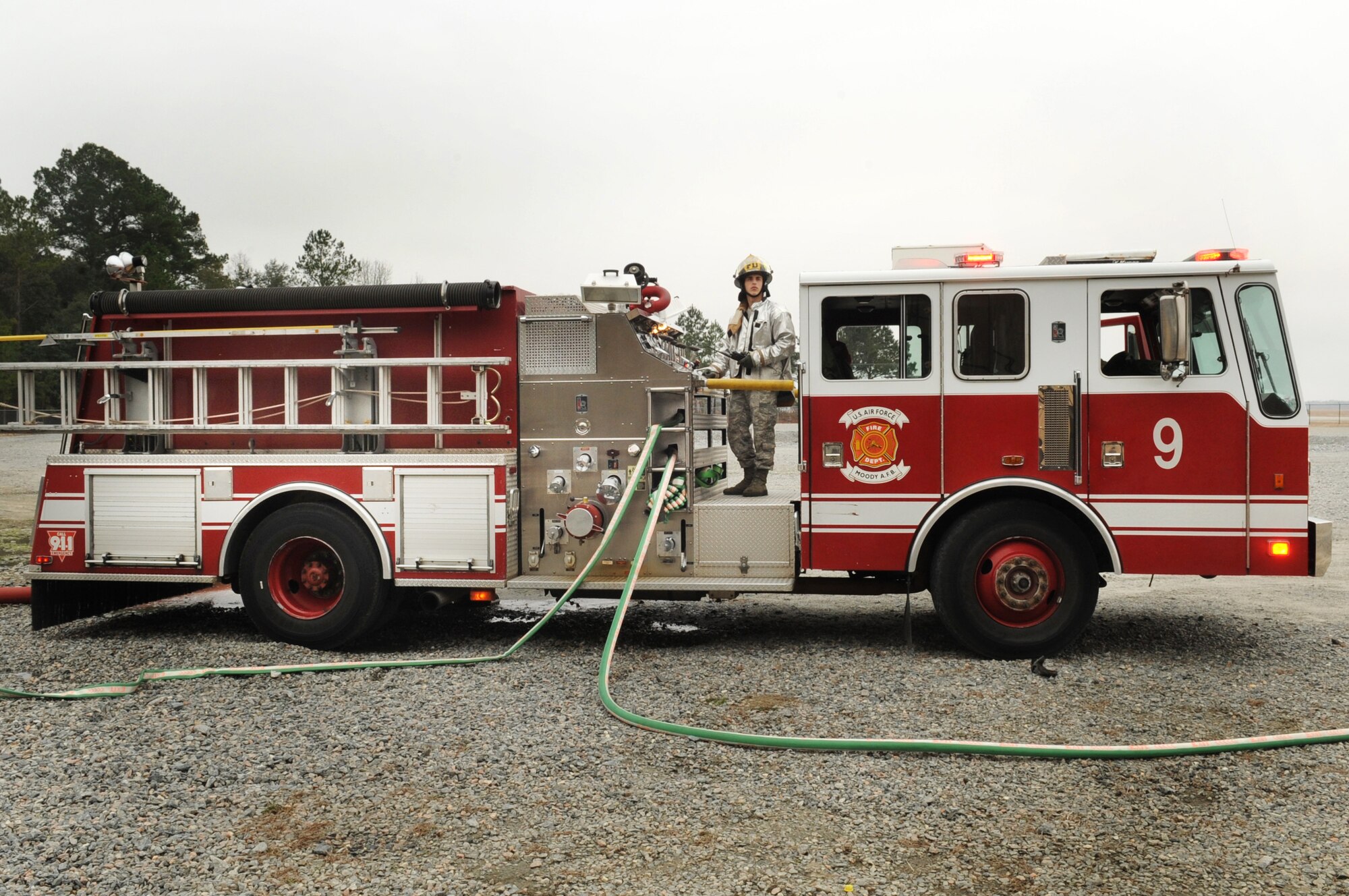 MOODY AIR FORCE BASE, Ga. -- Airman 1st Class Vincent Migliorino, 23rd Civil Engineer Squadron firefighter, operates a fire pump during a structural exercise Feb. 17. The fire pump controls the pressure of the water supplied to firefighters using the fire hose. (U.S. Air Force photo/Airman 1st Class Douglas Ellis)(RELEASED)
