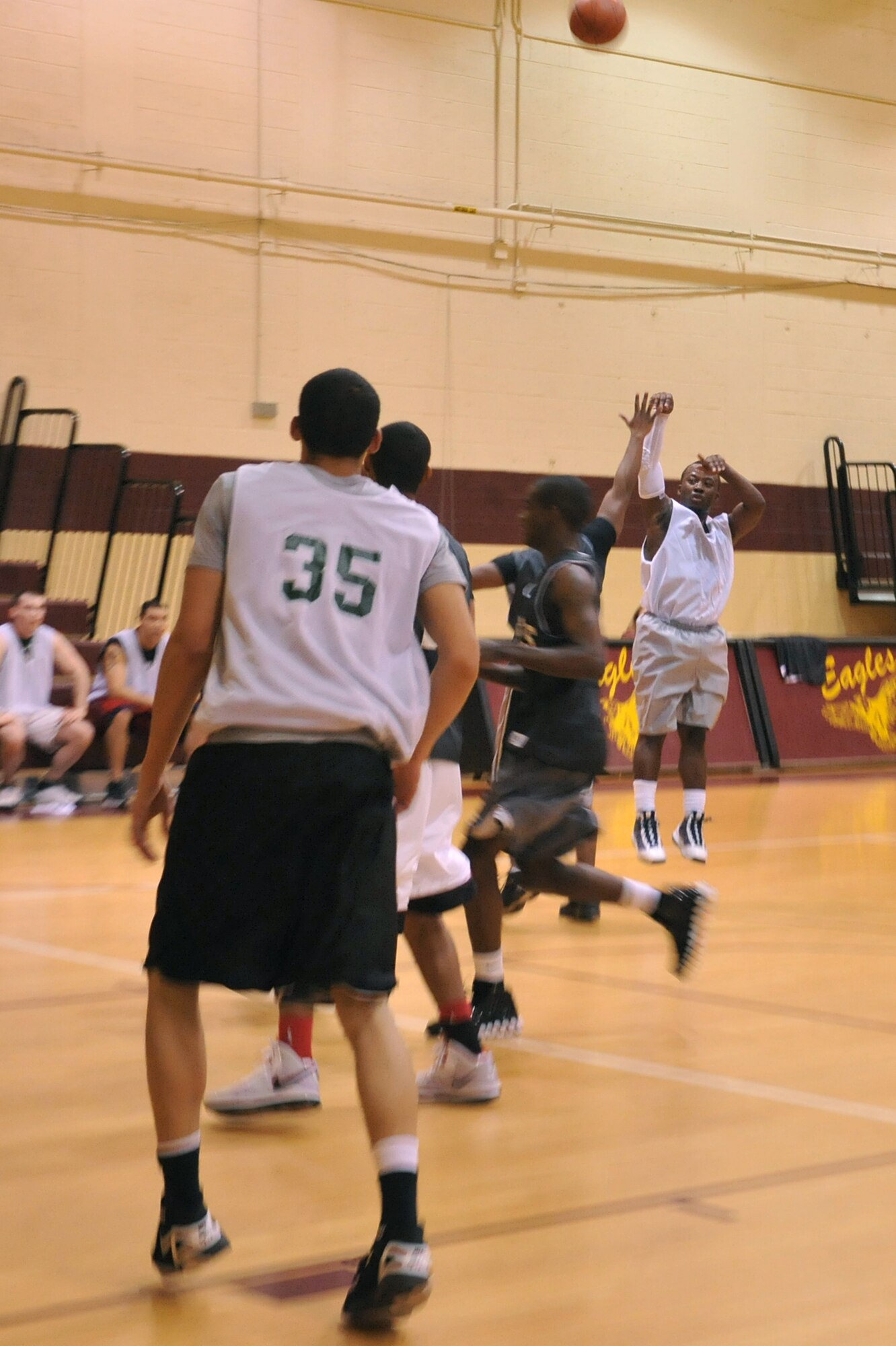 SEYMOUR JOHNSON AIR FORCE BASE, N.C. – Senior Airman Orlando Grantham shoots a three-pointer during an intramural basketball game here, Feb. 16, 2011. The 4th Force Support Squadron host instrumental games between squadrons in basketball, volleyball, softball and flag football. Airman Grantham is a native of Goldsboro, N.C. (U.S. Air Force photo/Senior Airman Whitney Lambert) (RELEASED)